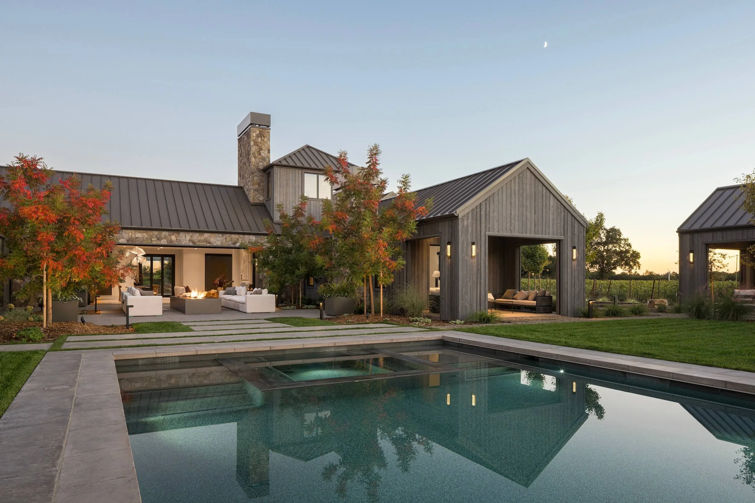 Napa Valley pool and outdoor lounge area bring depth and warmth to the outdoor living spaces of a Napa Valley compound.