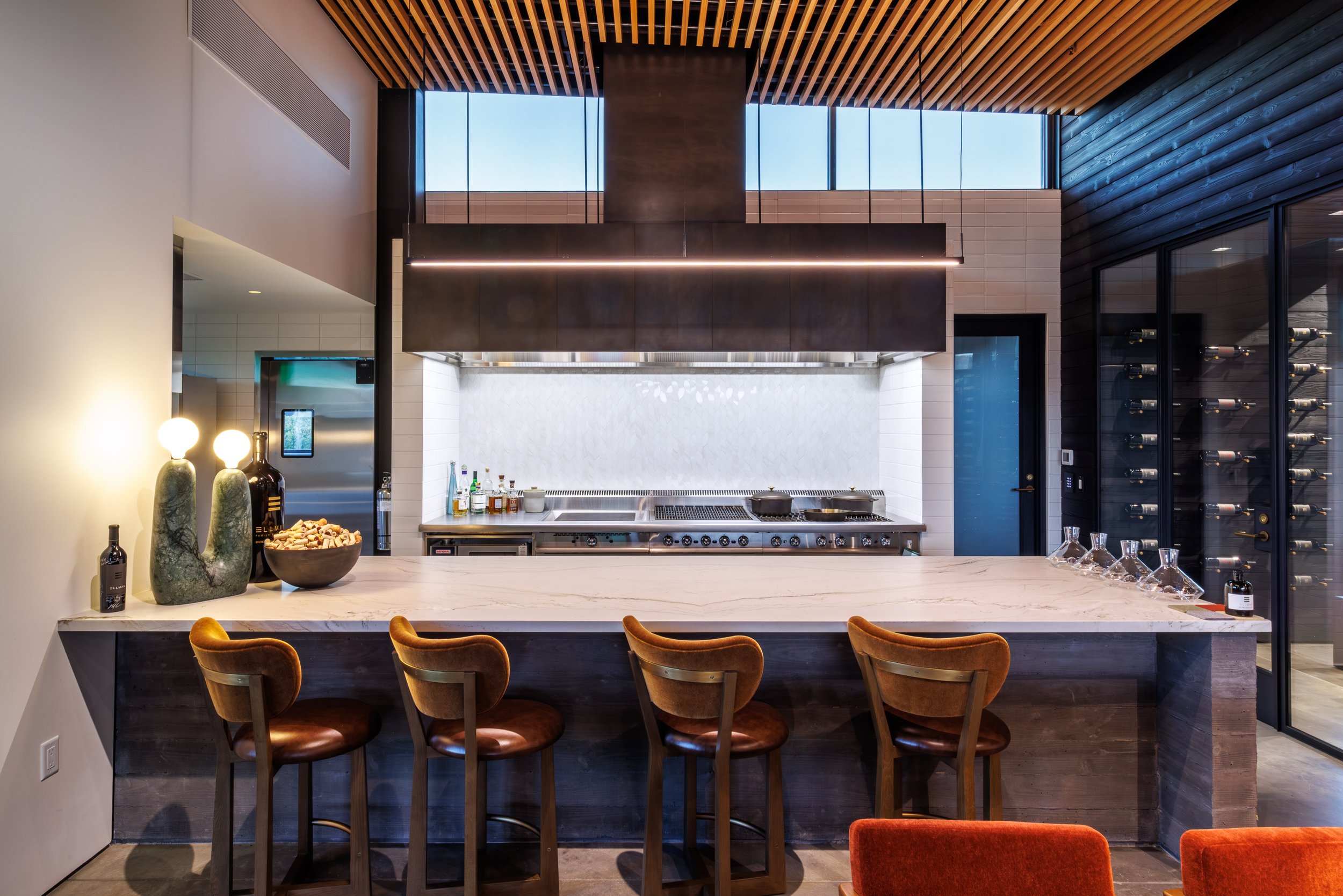 Integrated lighting and electrical systems support the functional and hospitality spaces within the modern Ellman Winery.