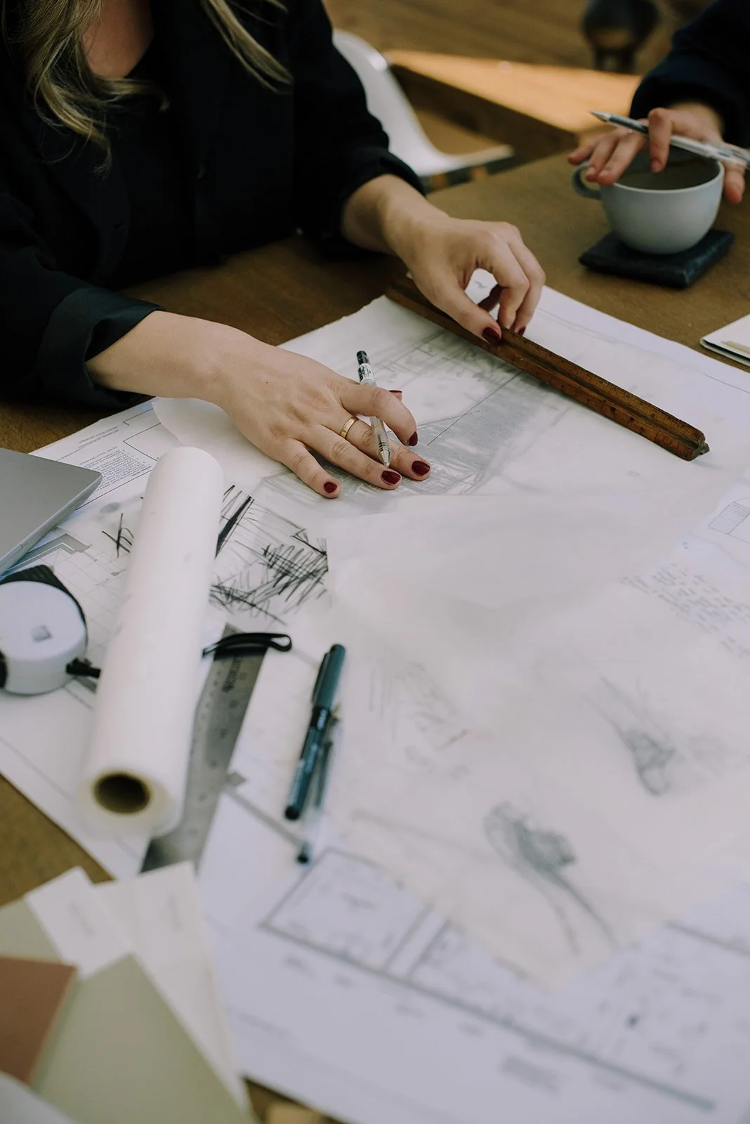 Anastasia Renaud sketching at the poliarchitecture office.