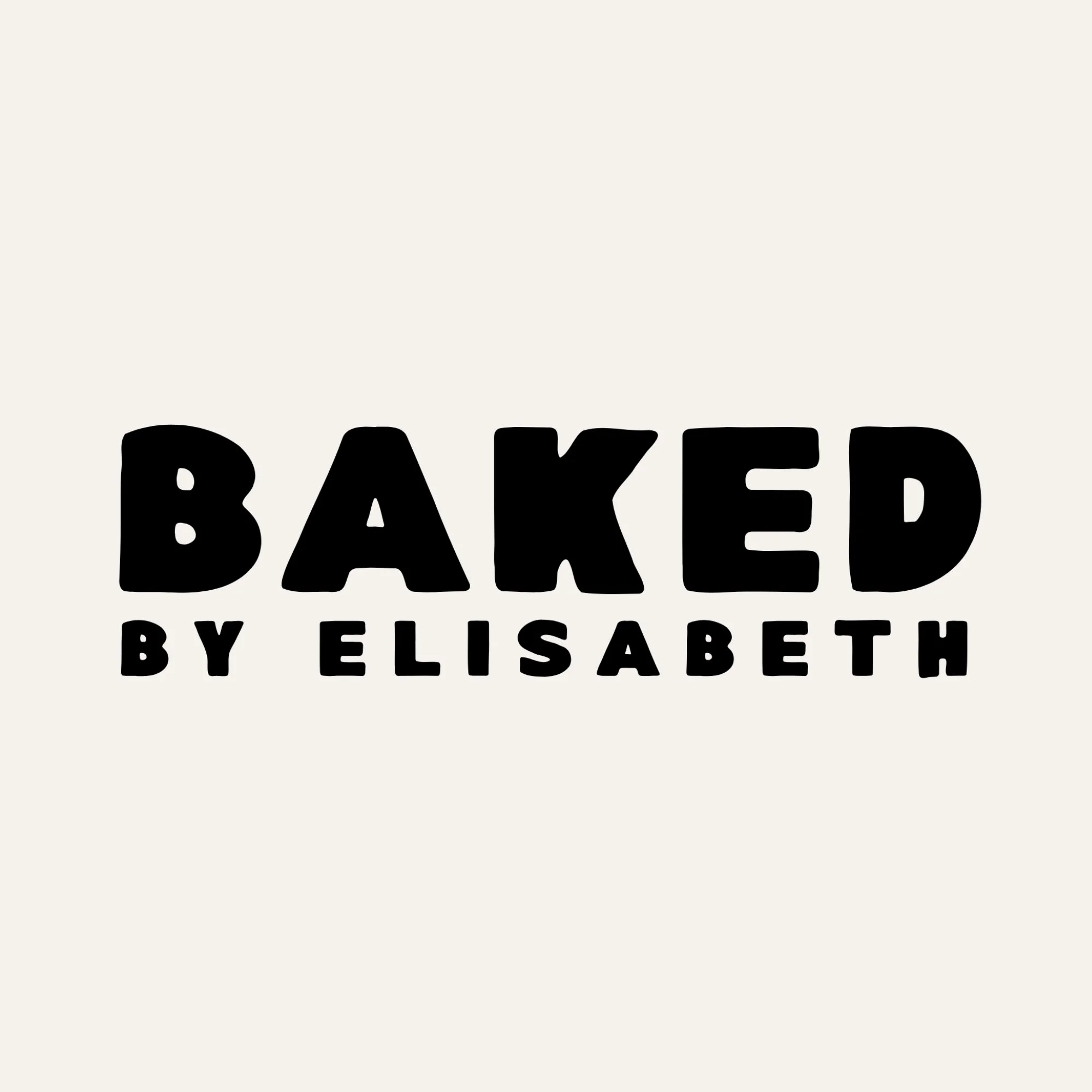 Close-up of a sign with bold black text that reads "Baked by Elisabeth" on a white background.