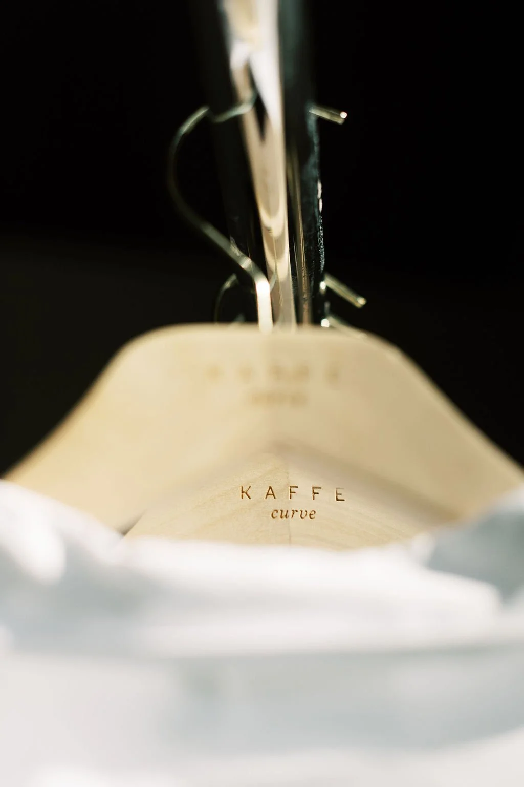 Kaffe Curve hangers on a rack at wholesale fashion agency at Susan Cooper Agency