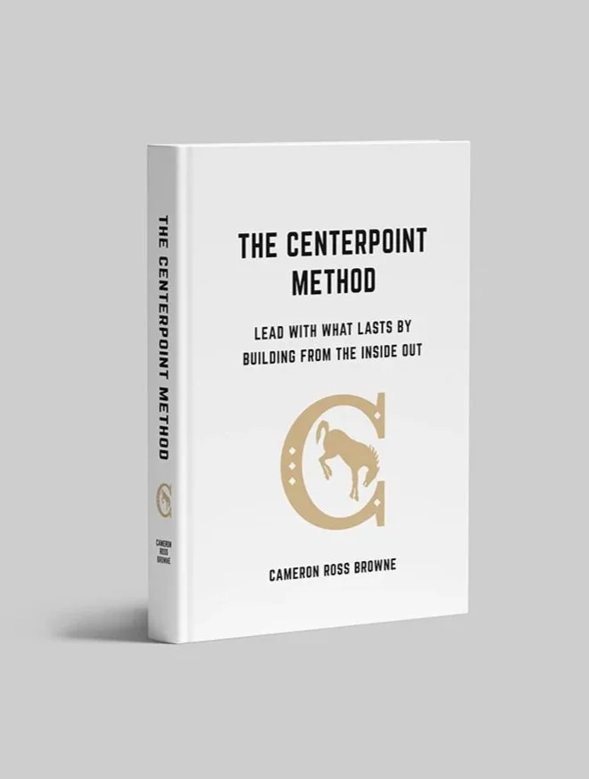 A white book titled "The Centerpoint Method" by Cameron Ross Browne. The cover features a stylized letter "C" with a dog silhouette inside.