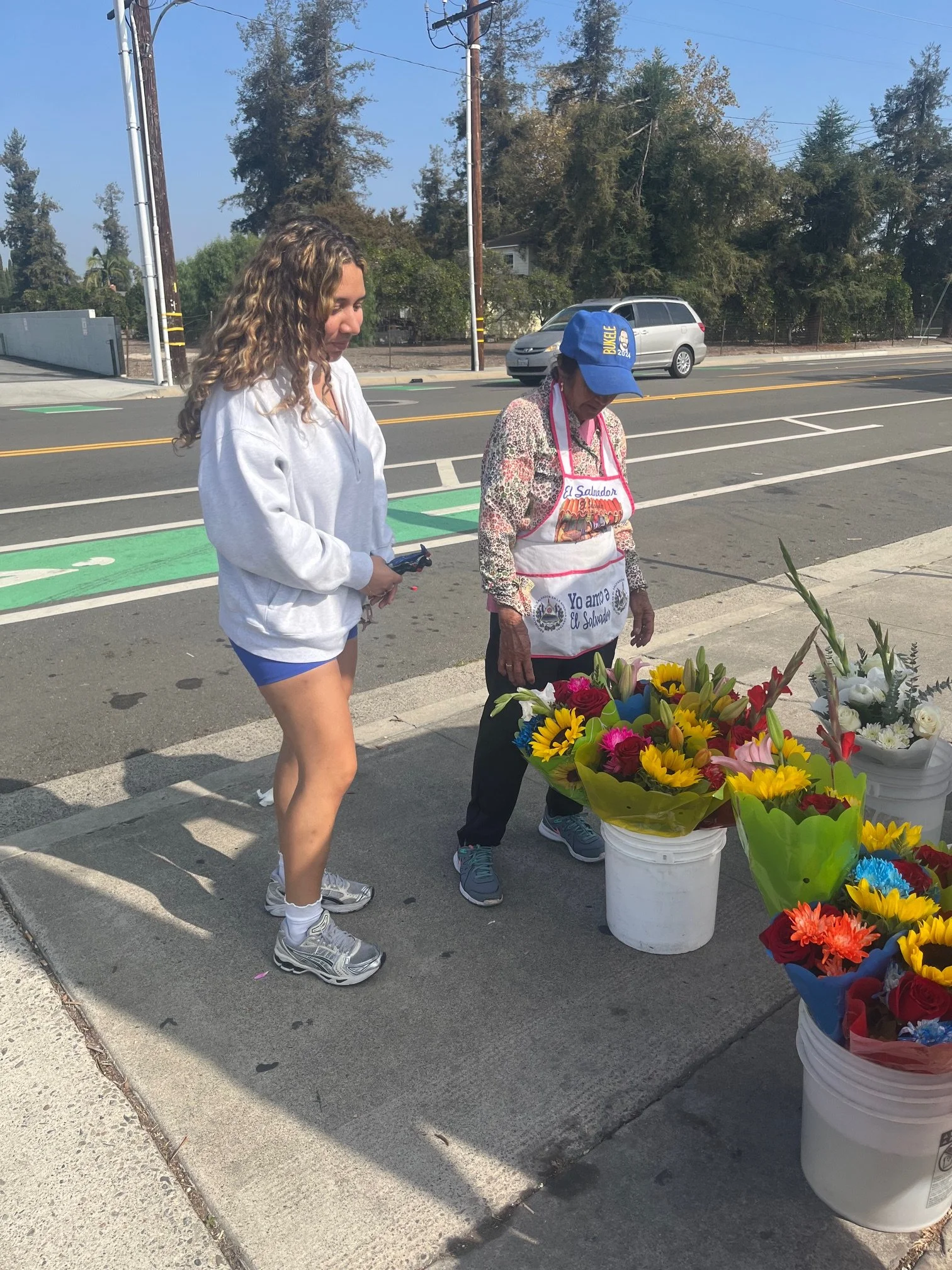 Volunteers Buying the Full Stock From a Flower Vendor to Give Out For Free