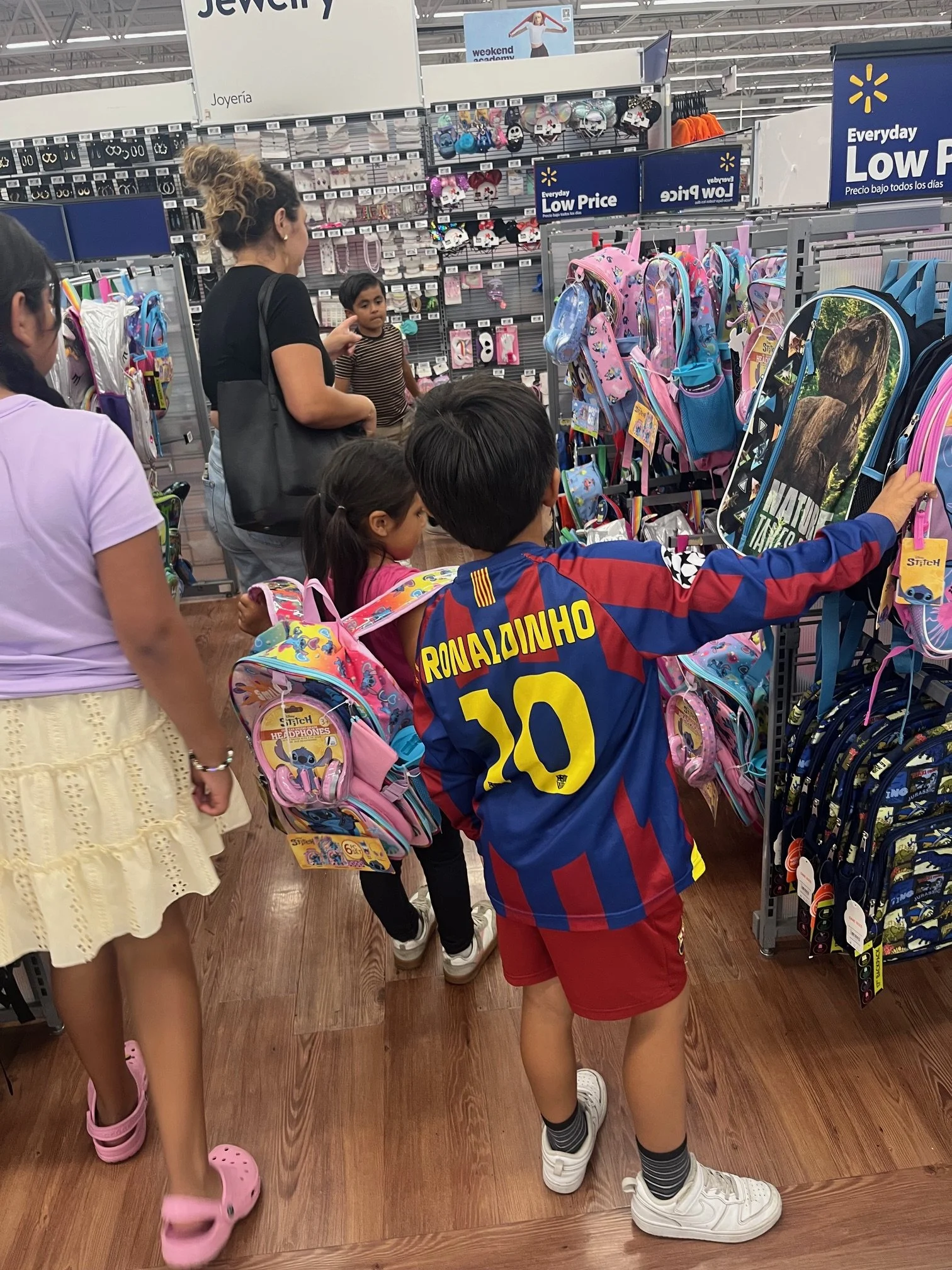 Volunteers Utilizing Donations to Buy New School Supplies For Children