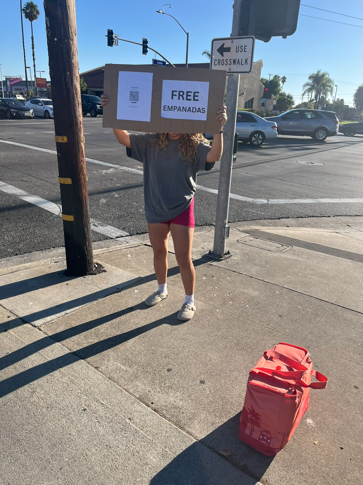 Volunteers Offering Free Empanadas Bought From a Street Vendor