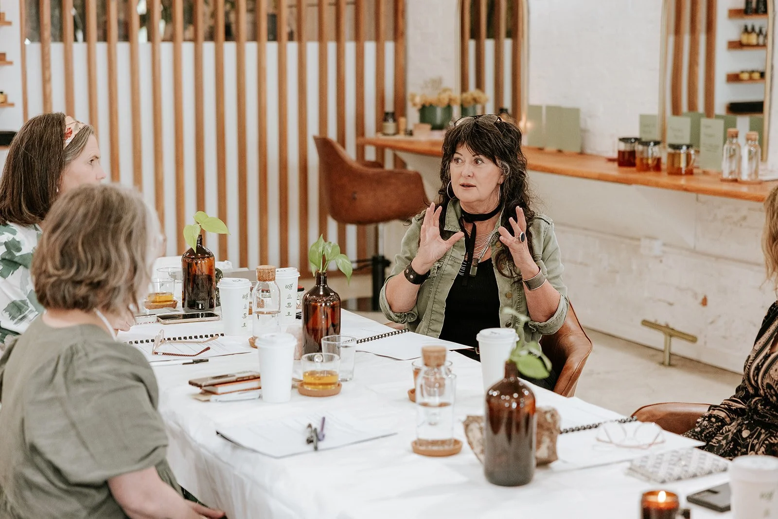 Tiffany Sinton sitting around a table with other visionary leaders..jpg