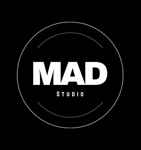 Black background with white circular logo that reads 'MAD Studio' in bold text.