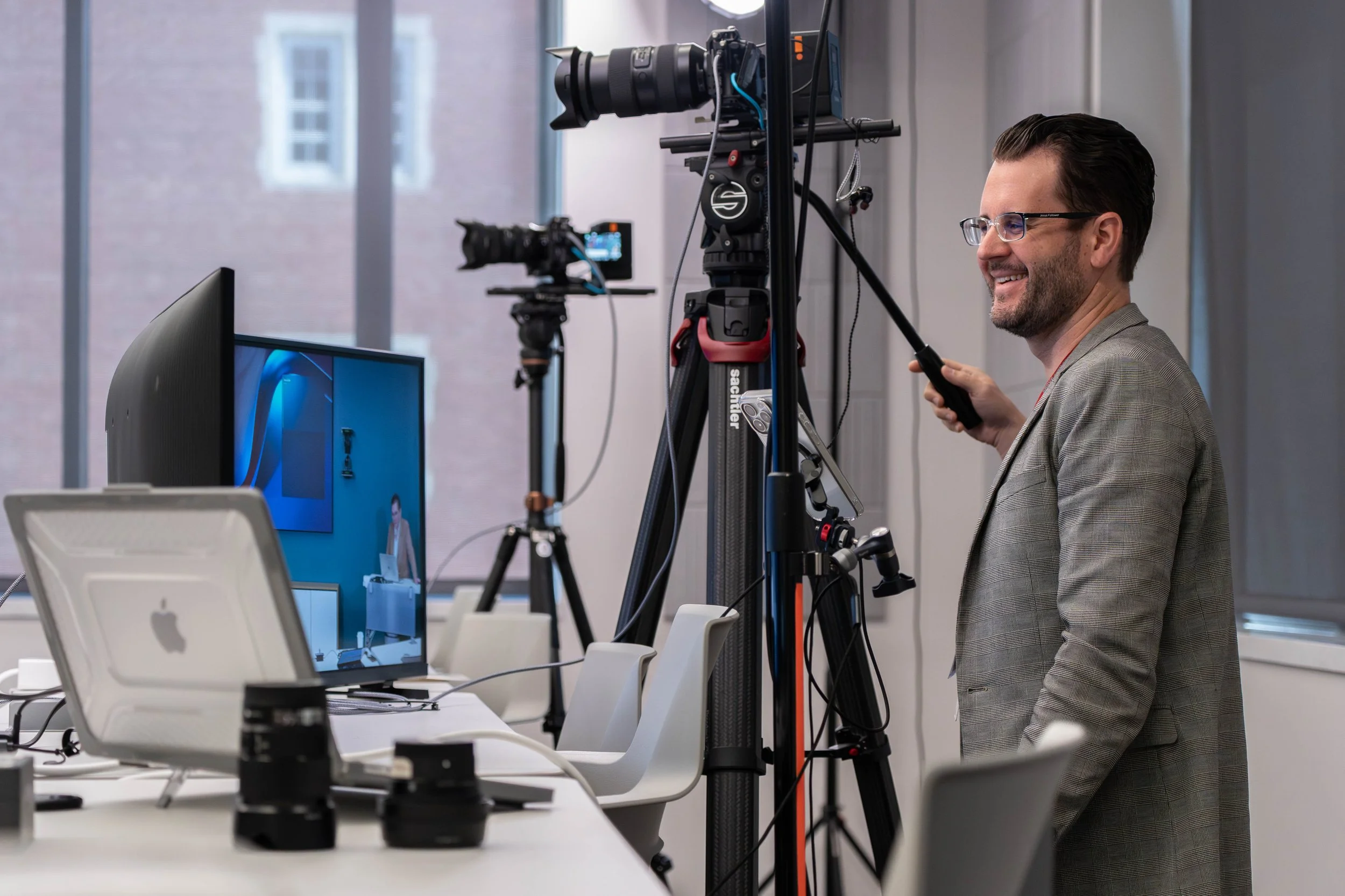 Trade Street Media videographer filming an educational course with professional cinema cameras in Pittsburgh, PA university.