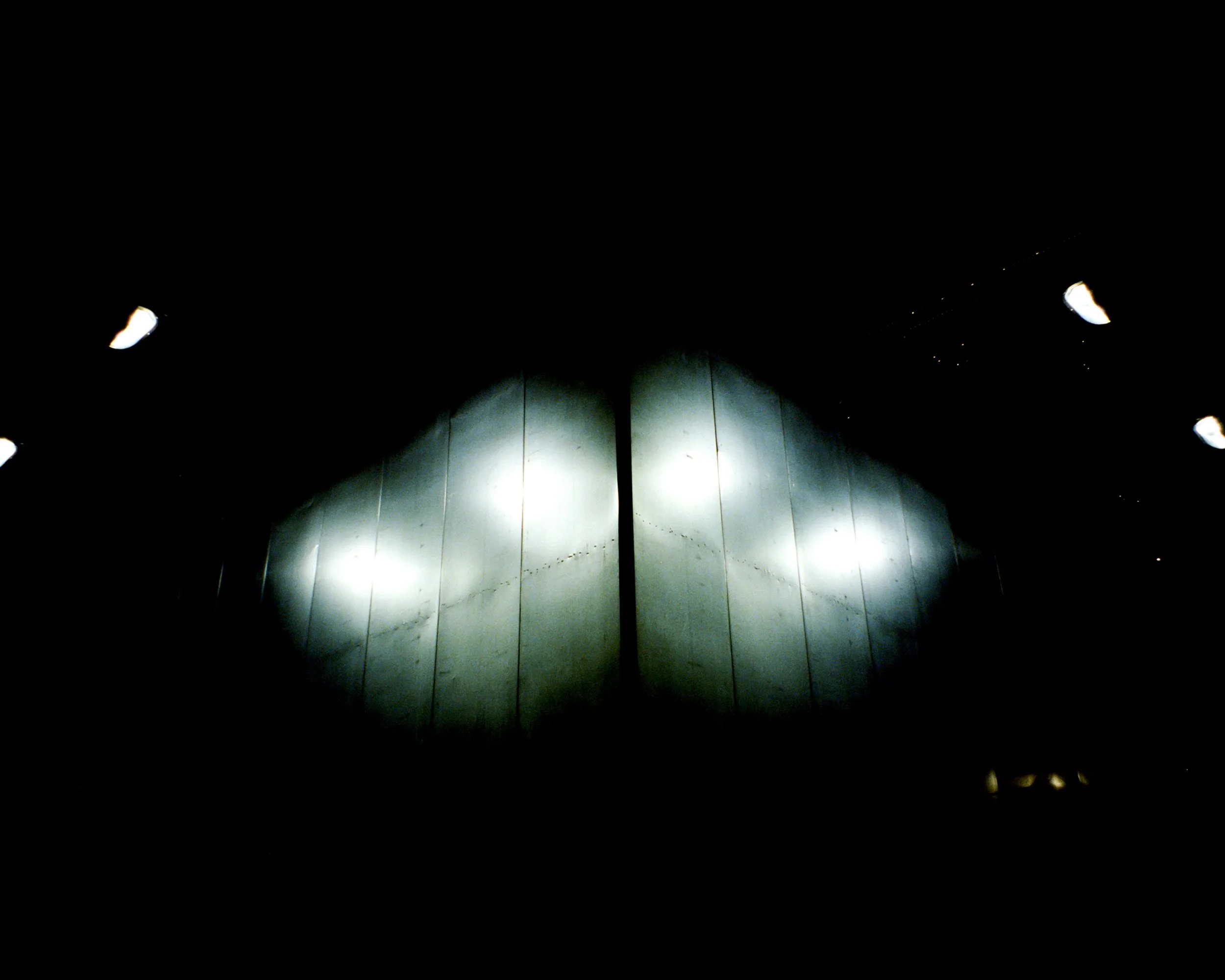 Lights reflecting on an empty billboard