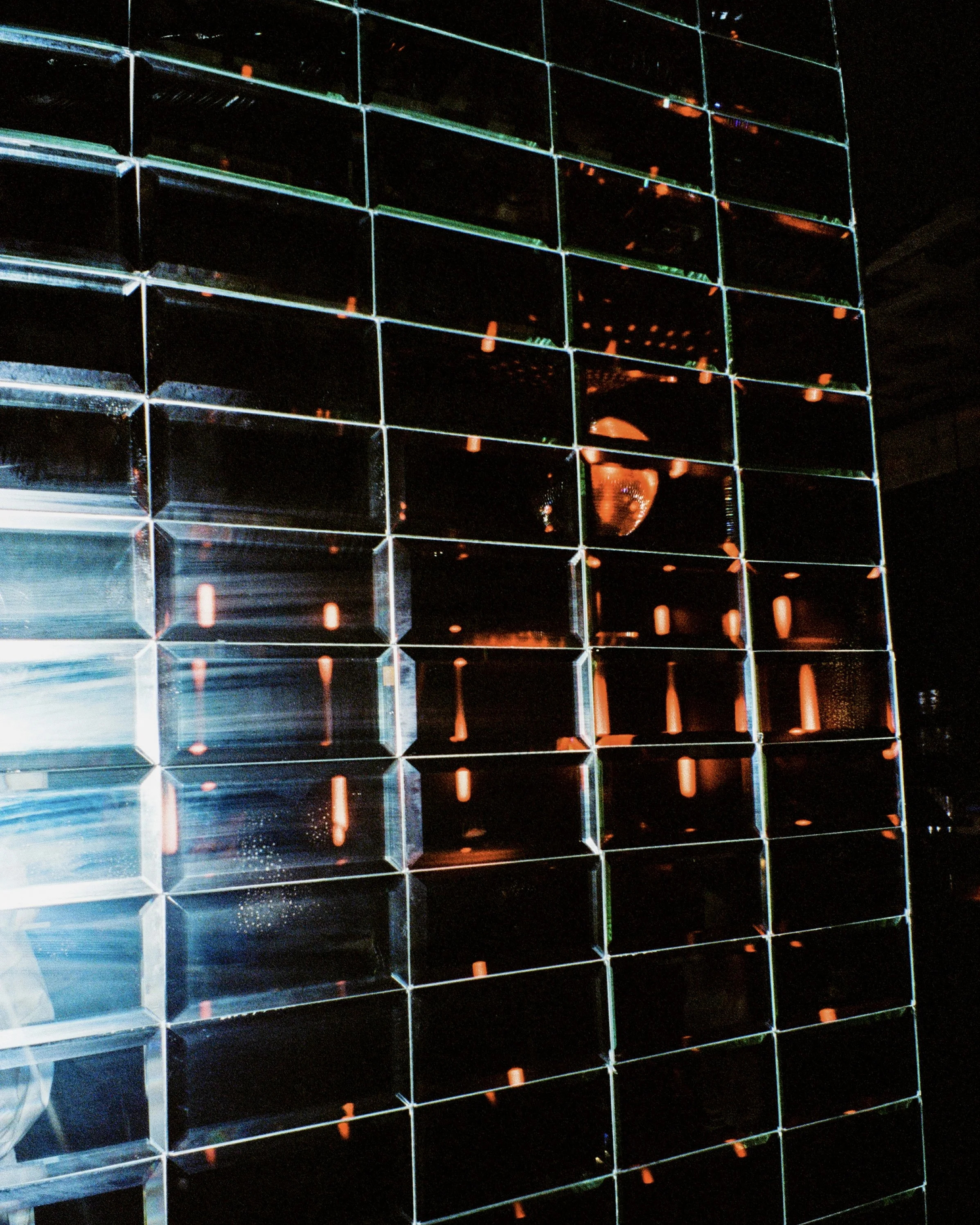 Reflection of mirror panels at a nightclub