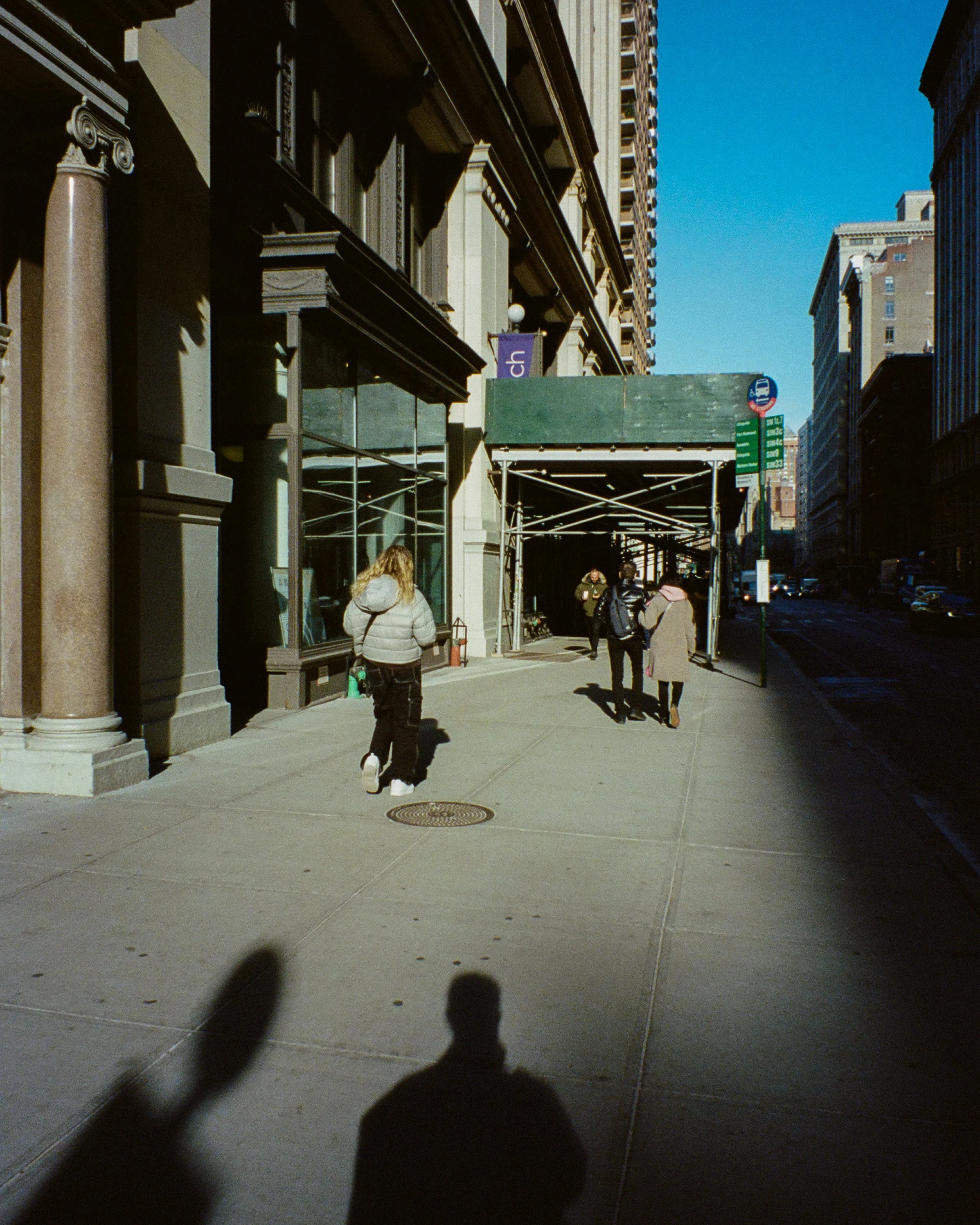 Pedestrians in the sunlight