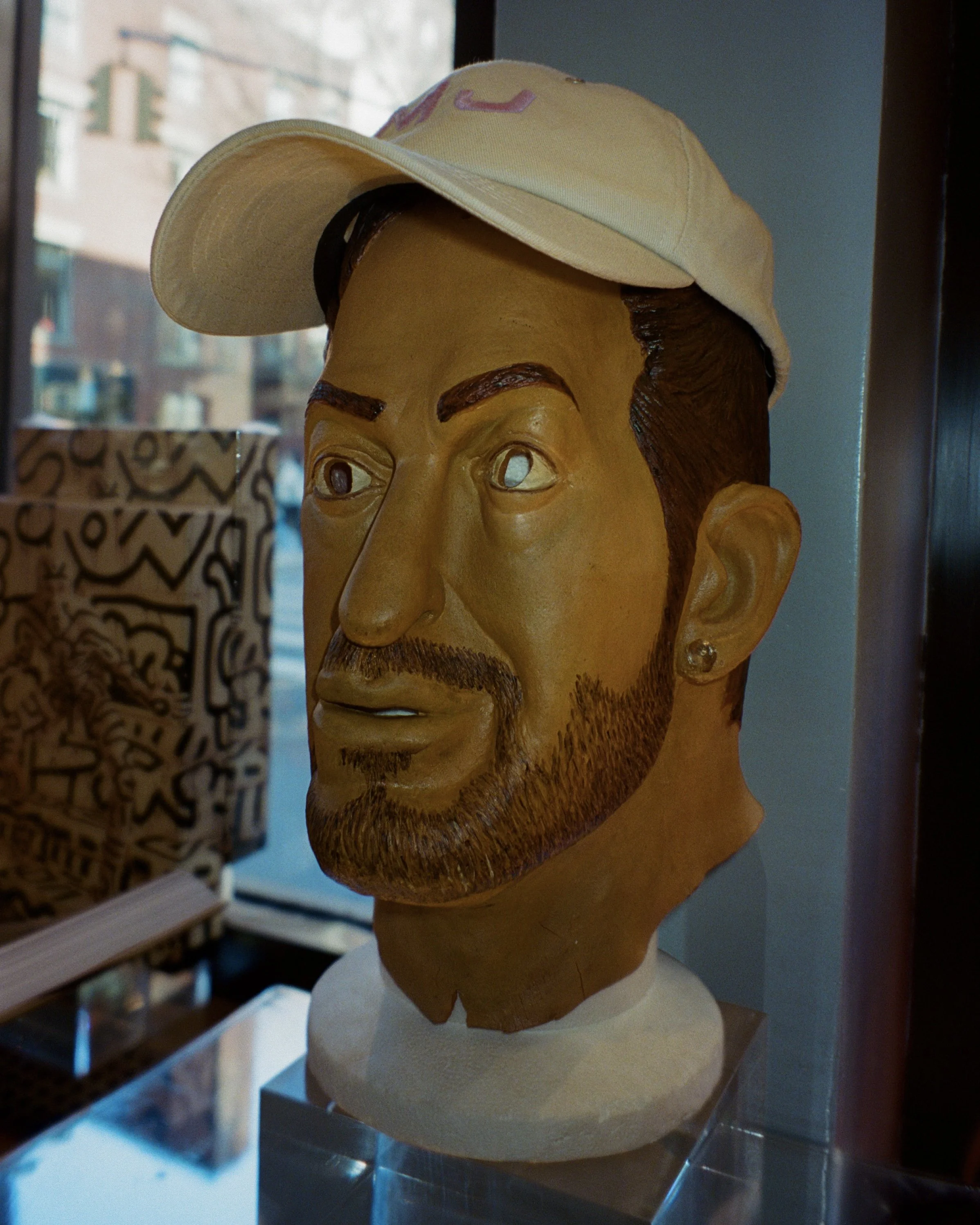 A latex mask of Marc Jacobs' head