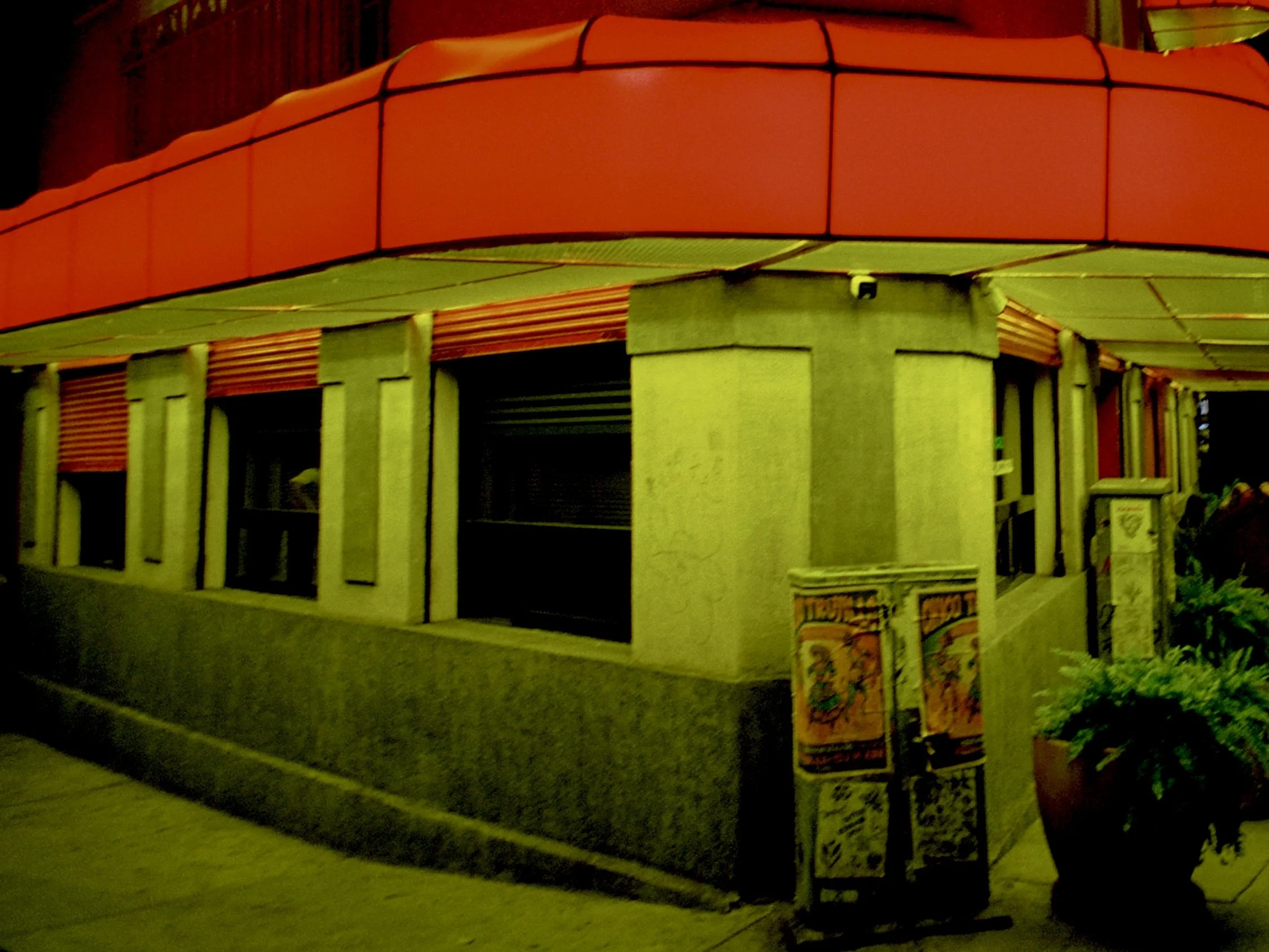 A Chinese-Mexican restaurant lit by yellow lights