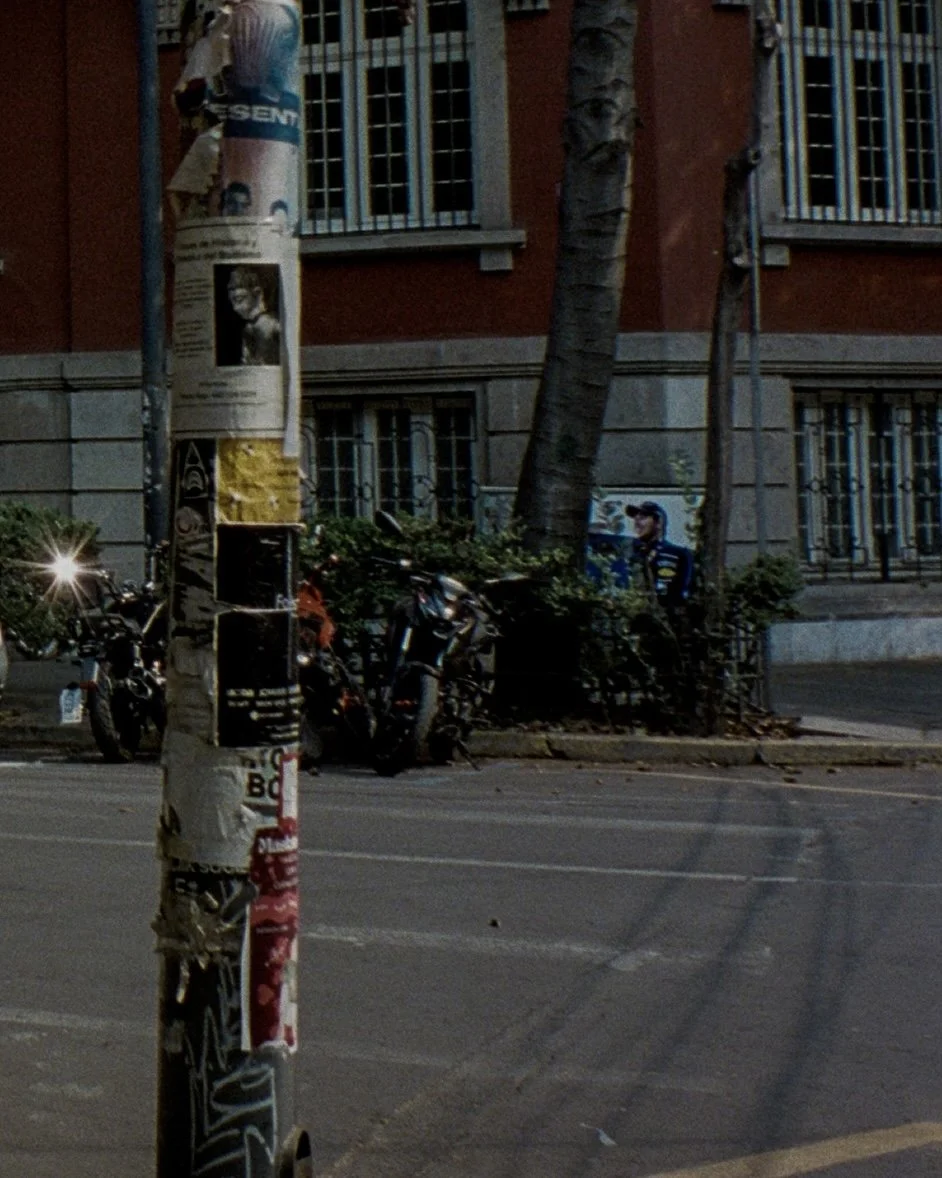 A light reflection in the mirror of a motorcycle on the street