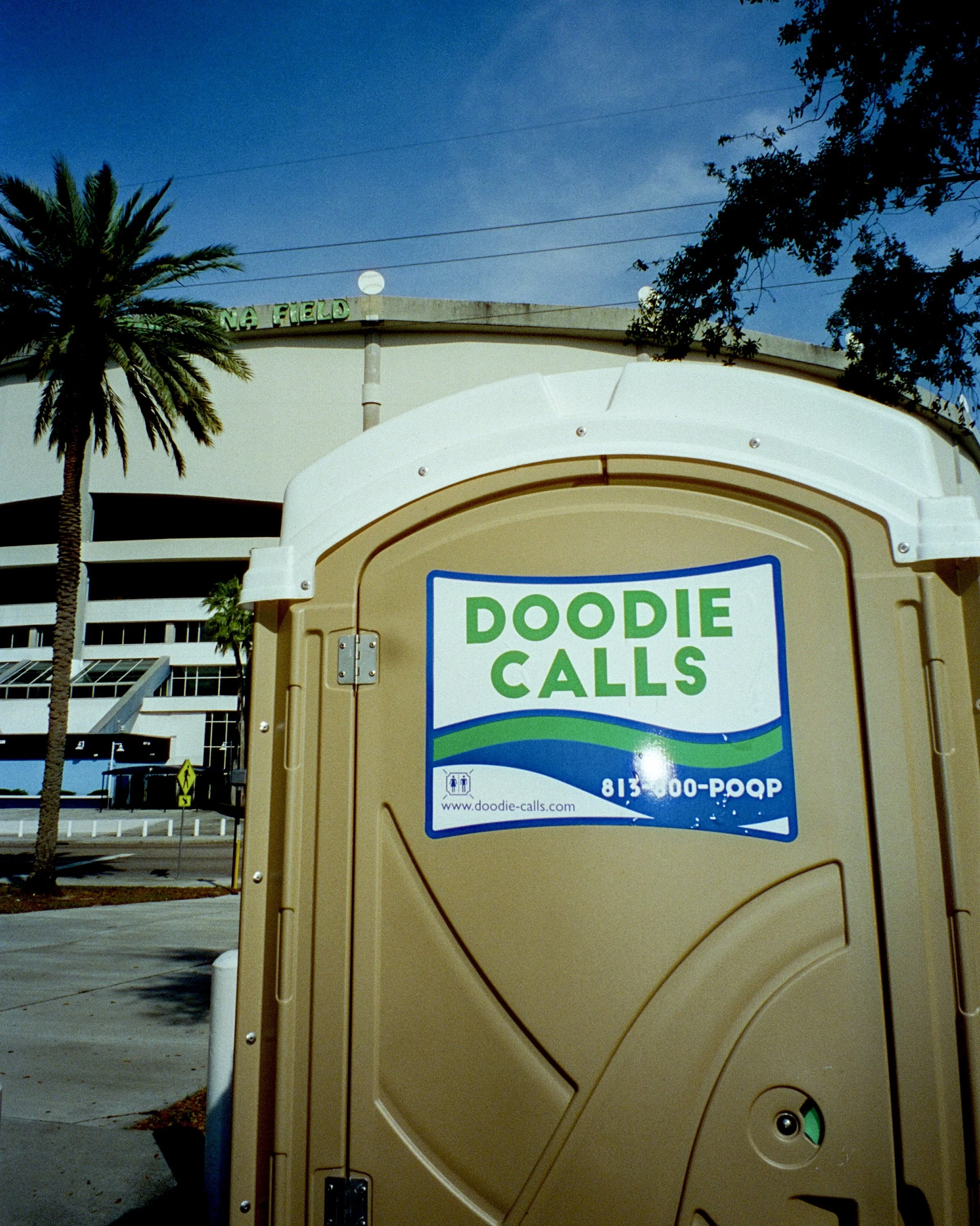 Advertising on a portapotty called Doodie Calls