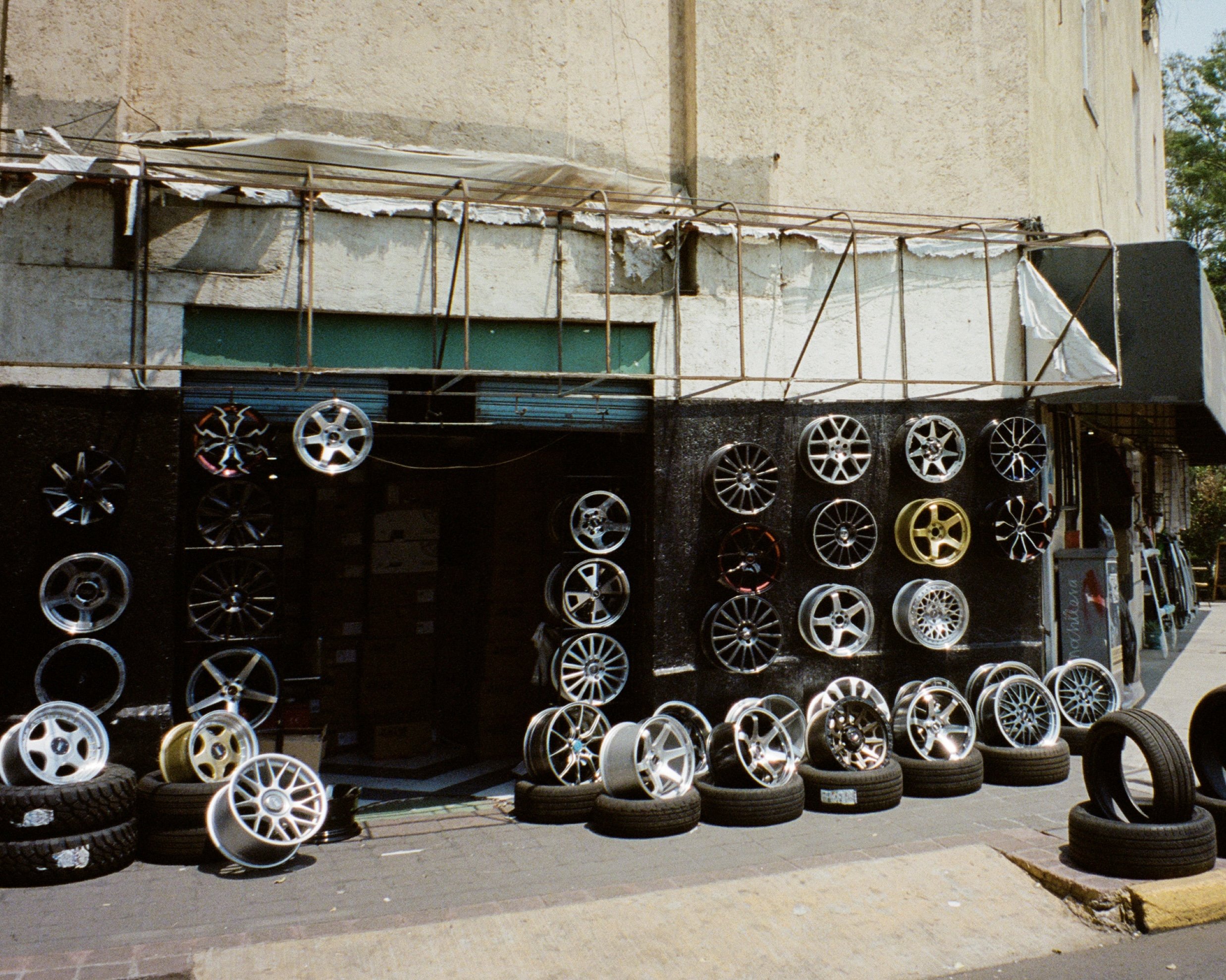 Tire rims displayed at a retail shop