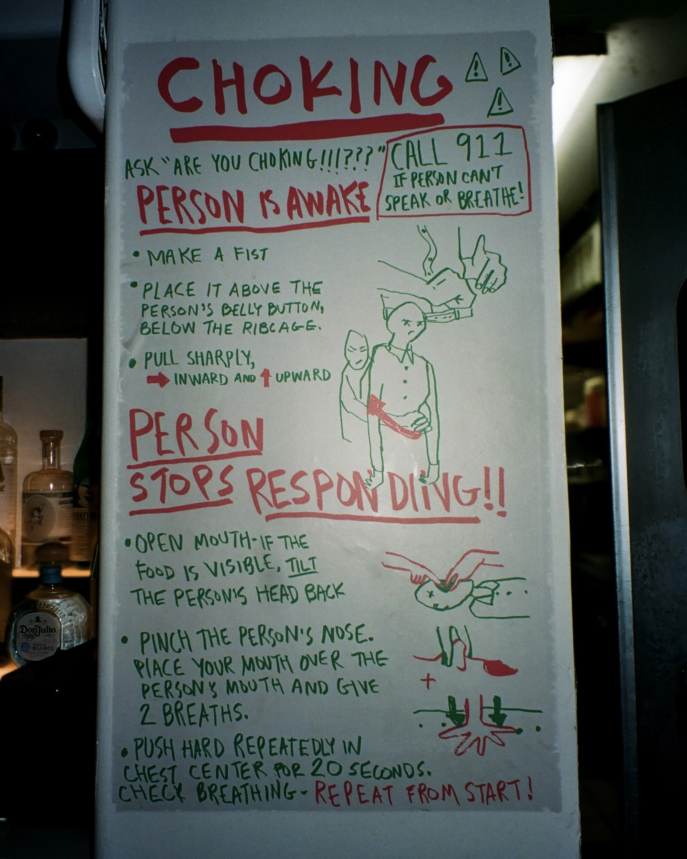 Hand drawn choking instructions signage