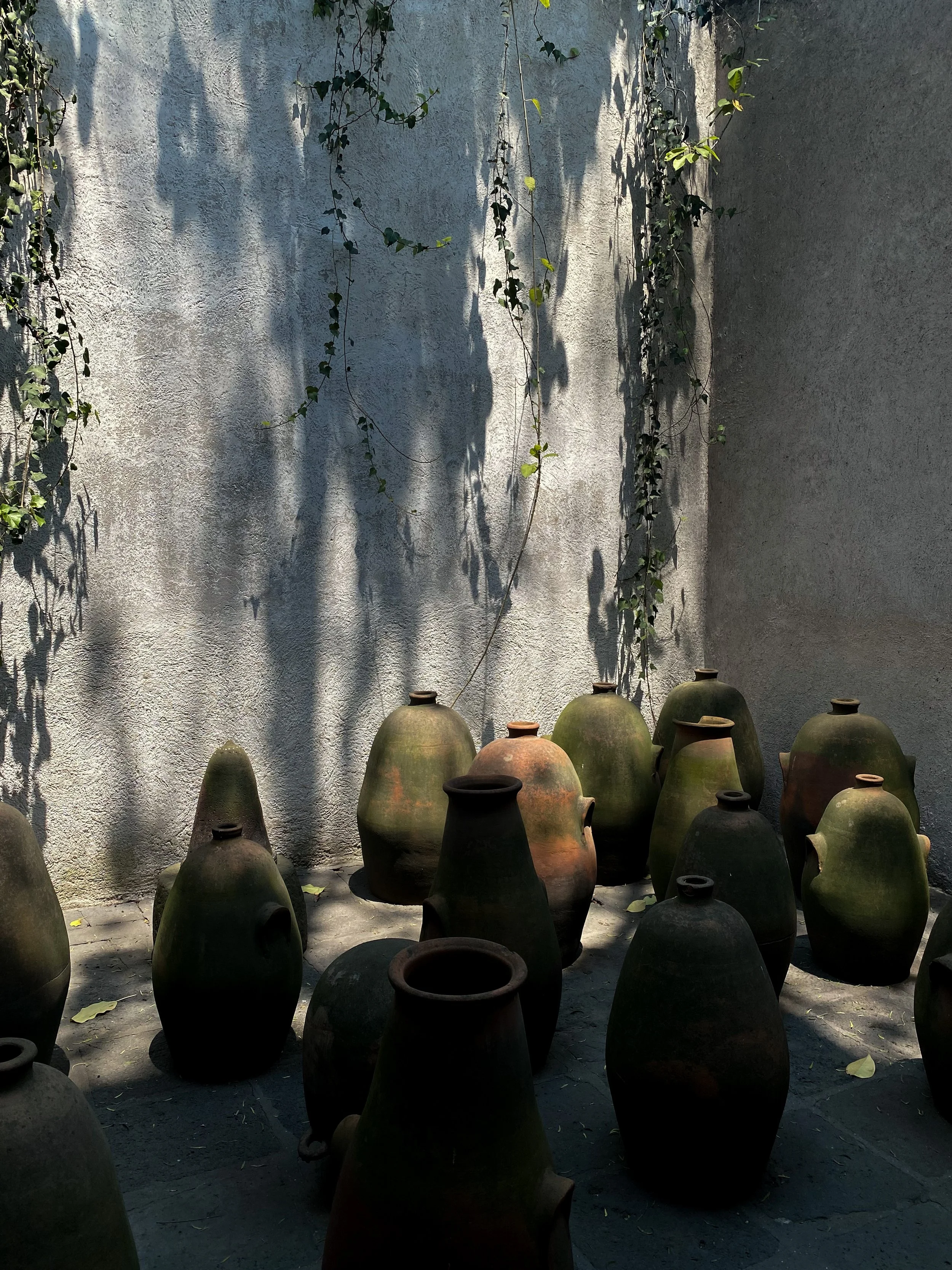 A collection of large pottery on the ground at Casa Barragan