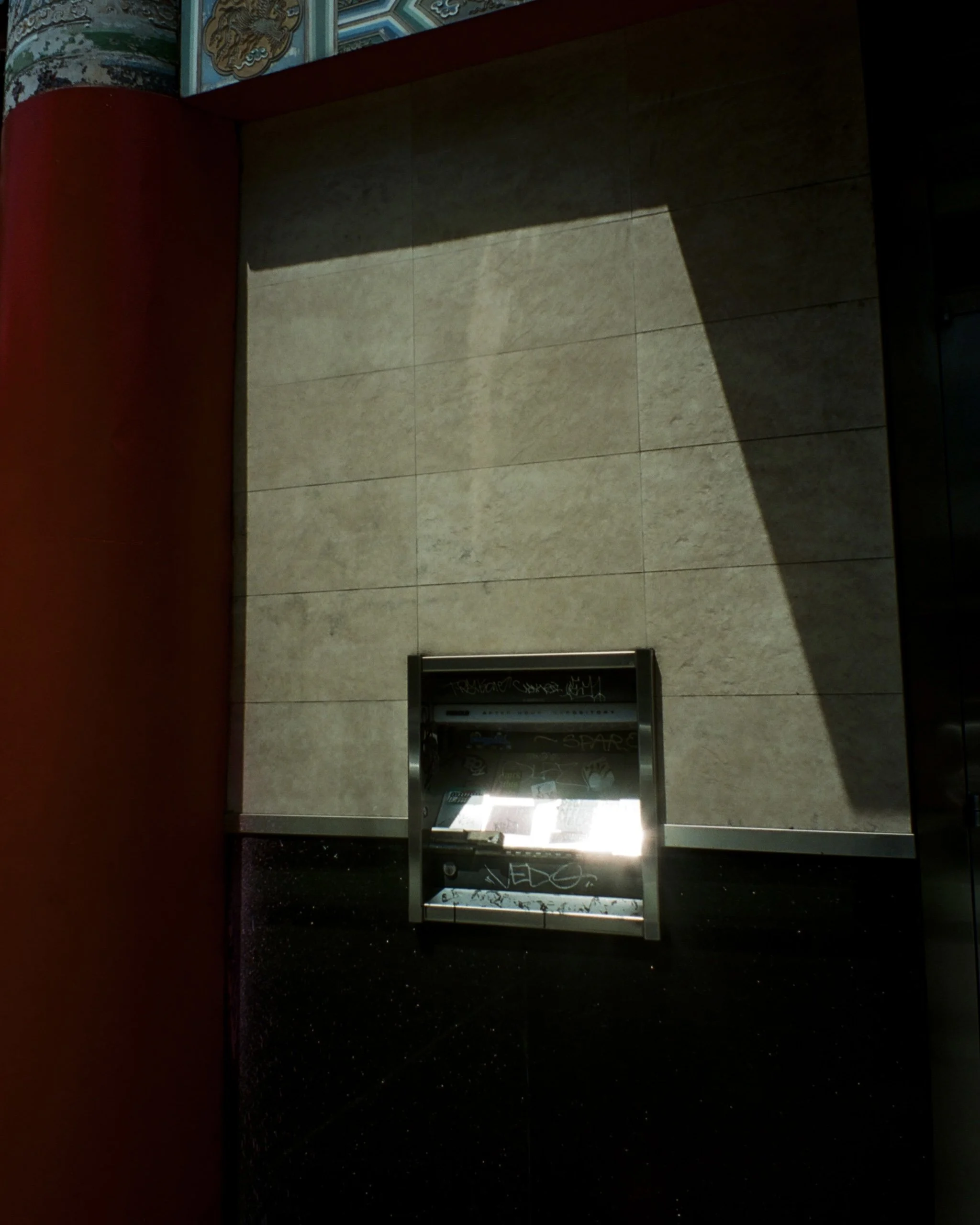 Photo of a delivery box reflecting the sunlight