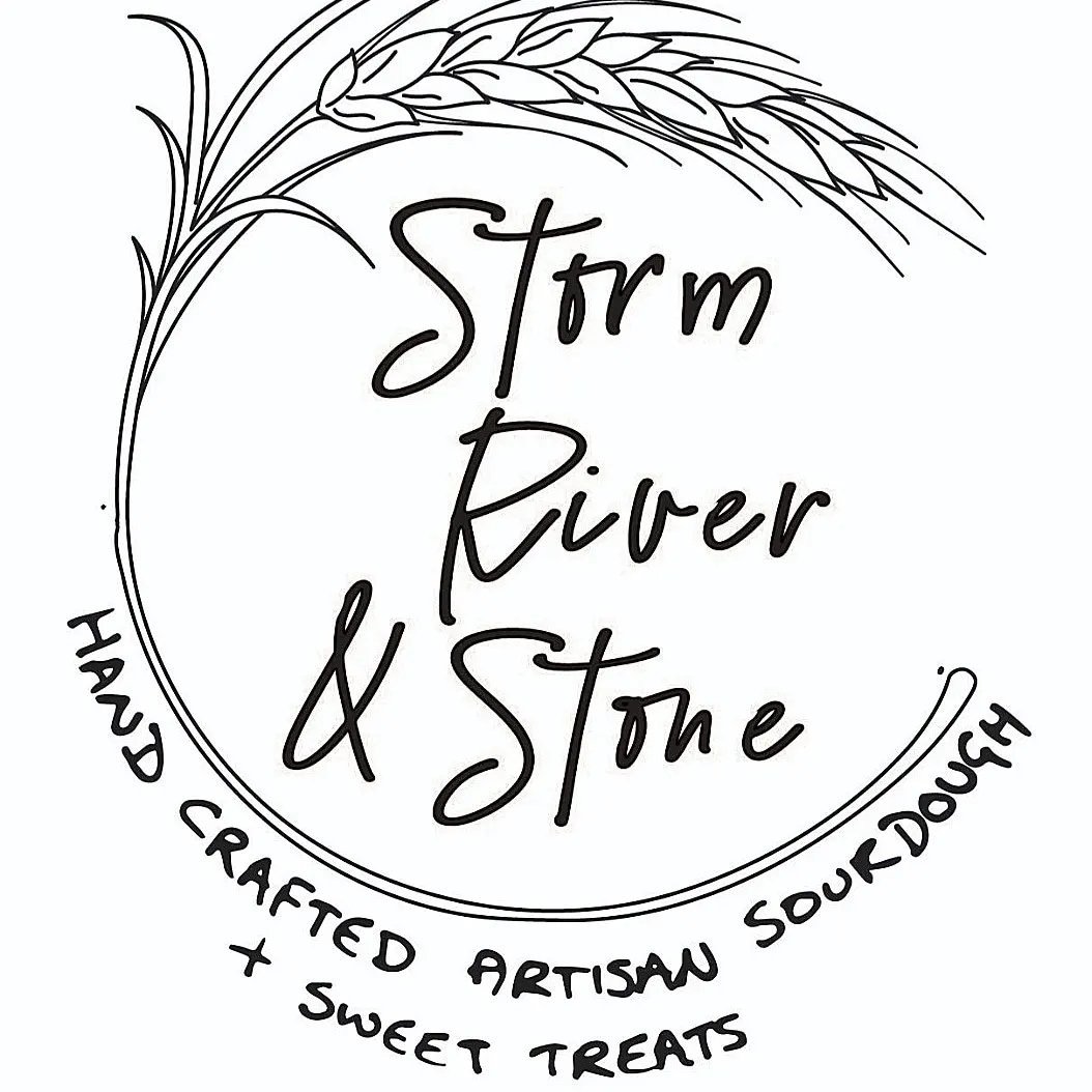 Hand-drawn logo for 'Storm River & Stone,' featuring a wheat illustration and subtitle 'Hand crafted artisan sourdough + sweet treats.'