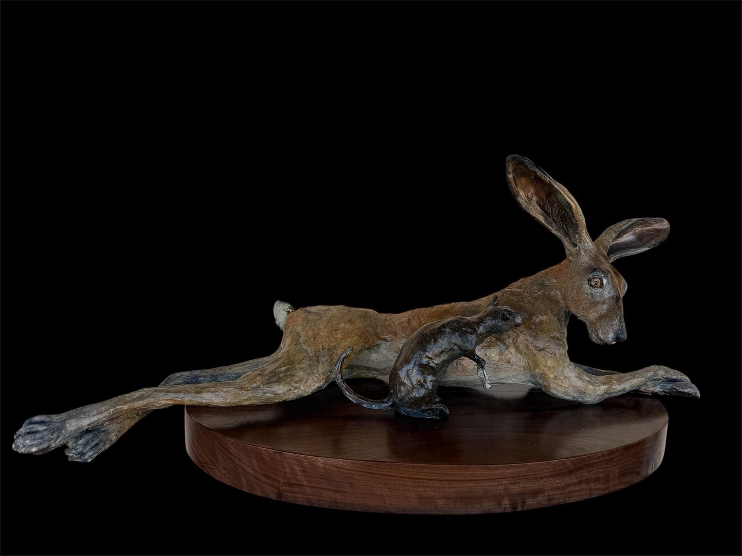 "Unlikely Friends: Shiny Offerings" • Size 26” long 12” wide 11” tall • For the first piece in this series, the rat brought something he knew the rabbit would want — a carrot.  Something enticing, so the friendship may begin. This time is different. 