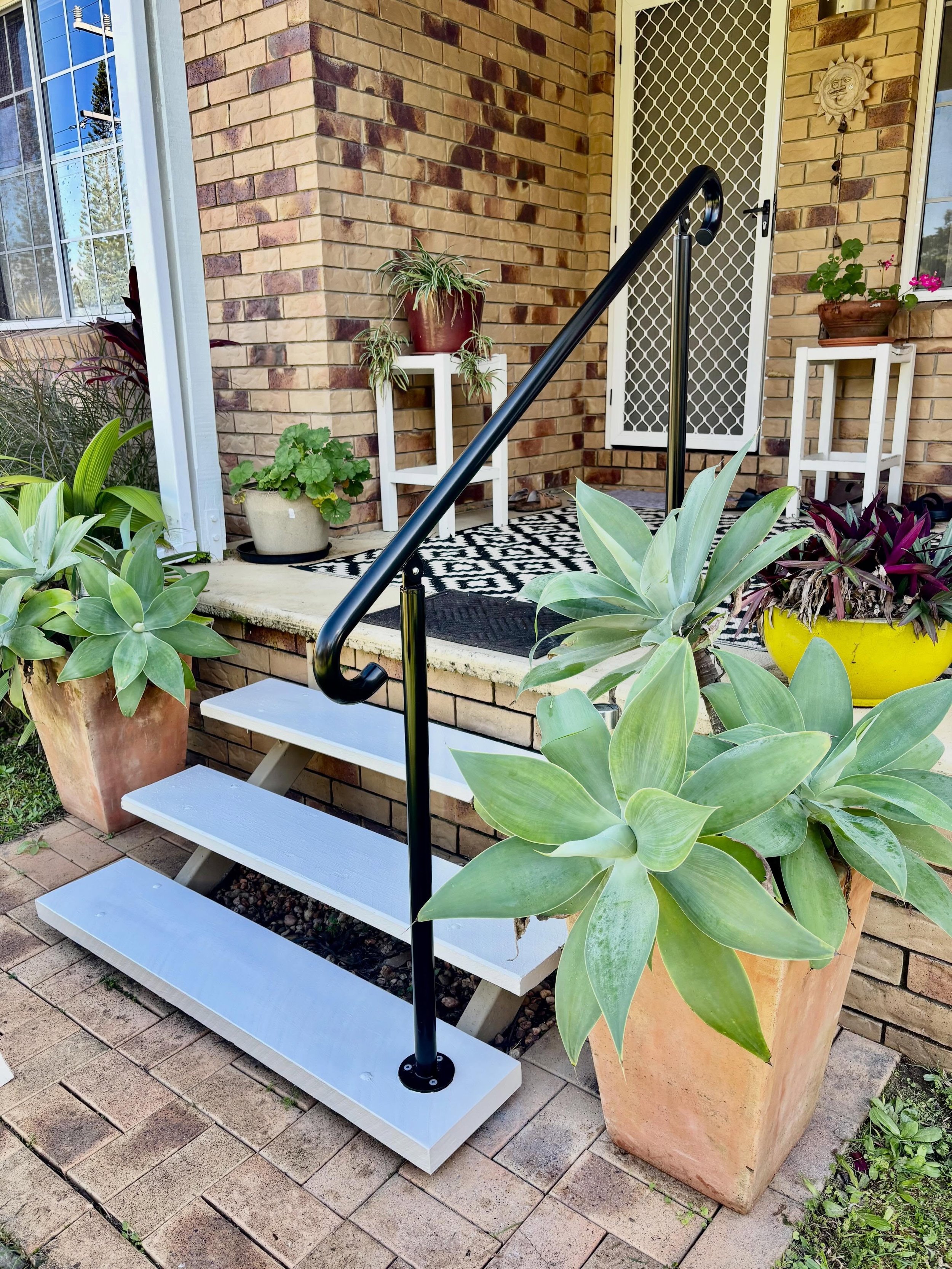 Today, we completed stair tread refurbishing and replacement, and installed a handrail for this customer.