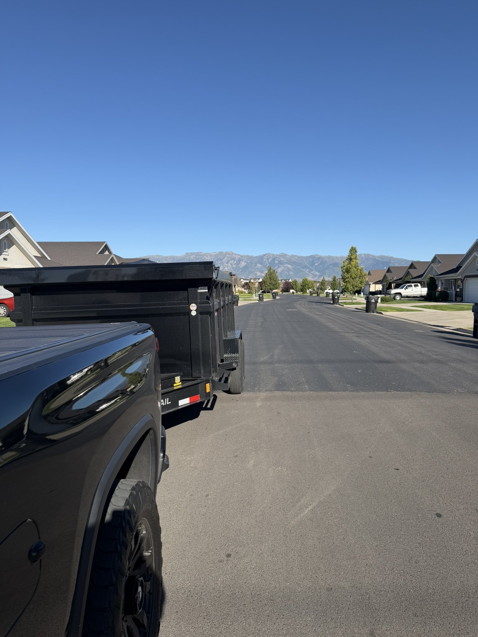 ZZYZX Services LLC Junk removal truck and dump trailer serving customers in Northern Utah NOW