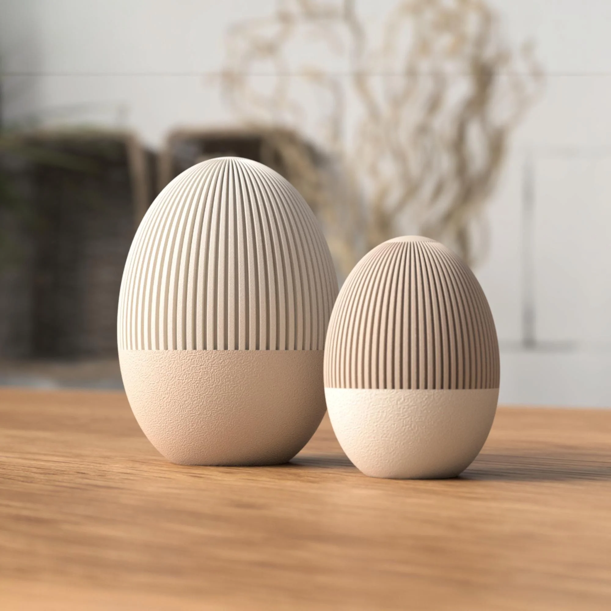 Befüllbare Osterei Dose ohne Ohren in zweifarbiger Ausführung mit kleinem passenden Ei, schlicht inszeniert auf Holz im modernen Japandi Stil.