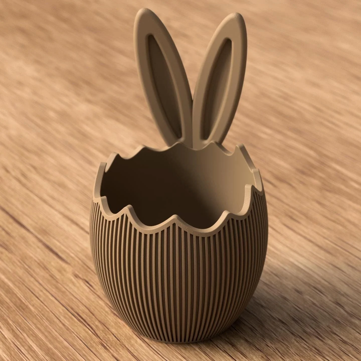 Gelbe Osterschale mit Hasenohren in aufgebrochener Eierschalenform, dekorativ platziert als fröhlicher Farbakzent für die Osterdeko.