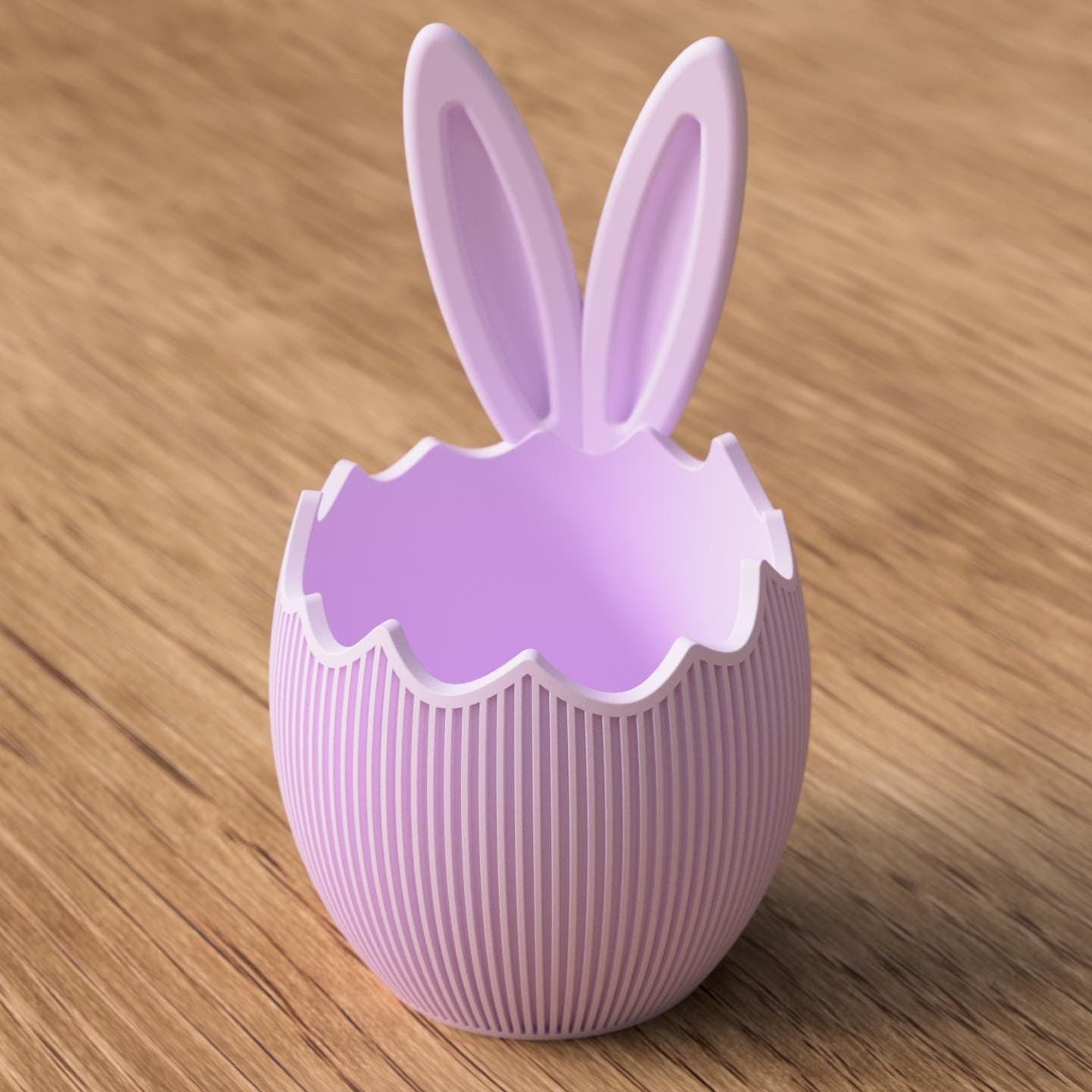 Osterschale mit Hasenohren in Flieder und weißem Eierschalenrand, dekorativ gestaltet für eine verspielte Frühlingsdeko.
