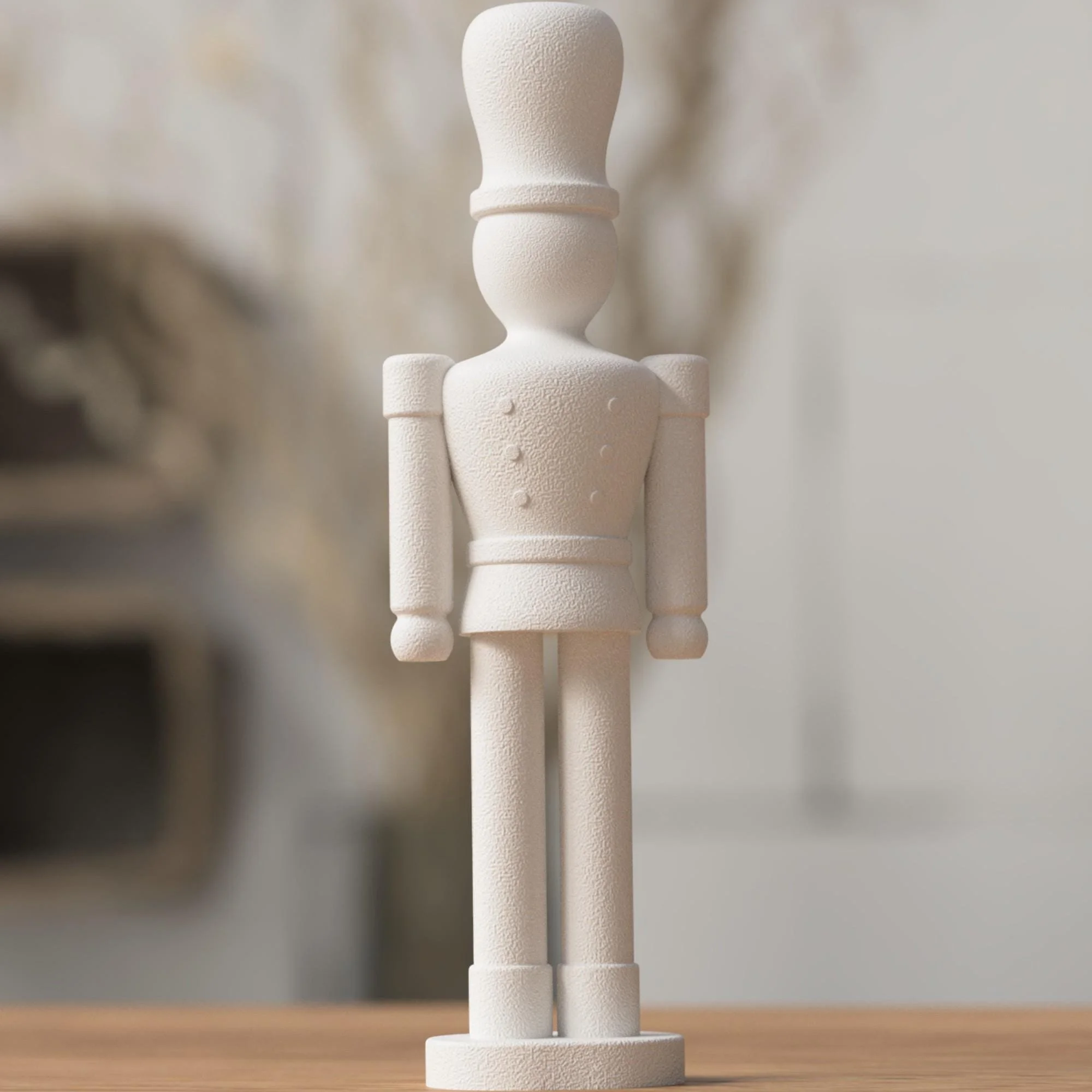 Weißer Nussknacker mit reduzierter Formensprache frontal auf Holzfläche, passend für minimalistische Weihnachtsdeko.