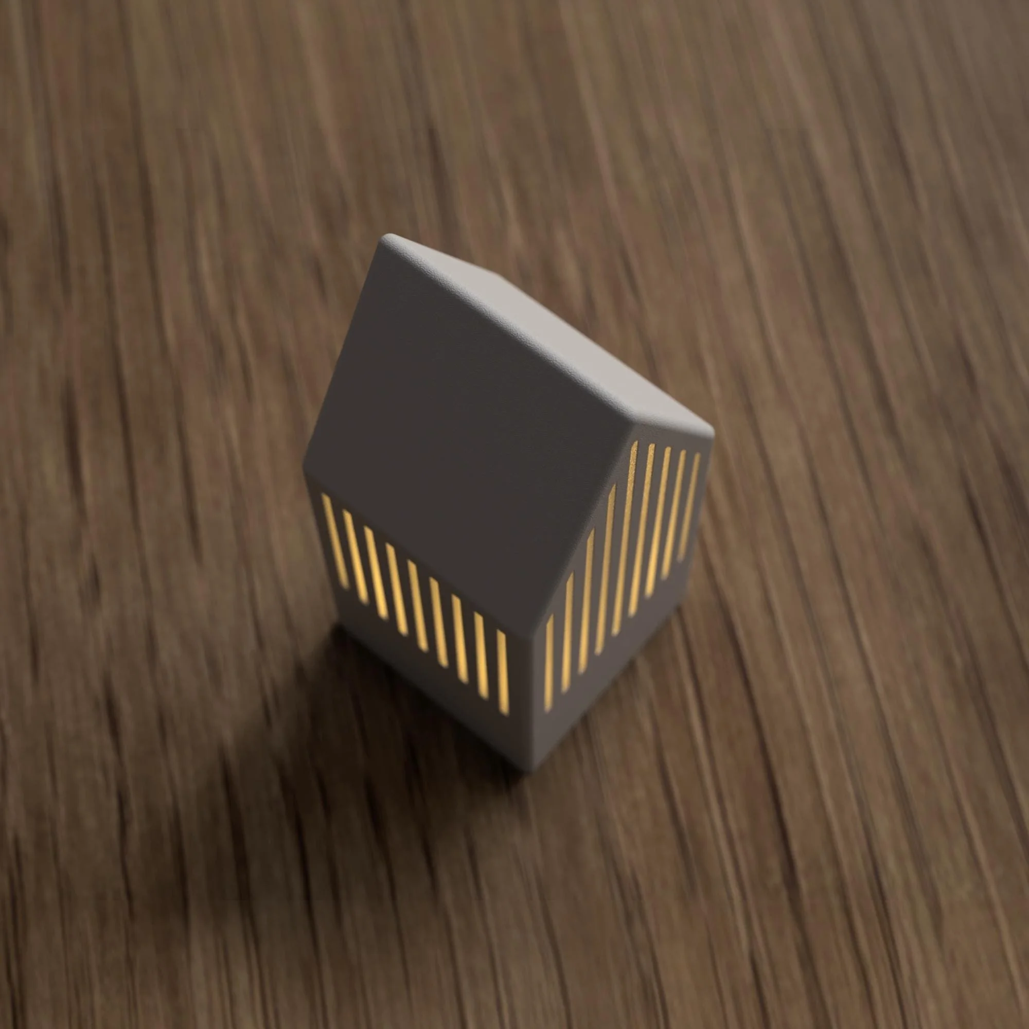 Kleines Japandi Teelichthaus in Grau mit warmem LED-Licht, schräg auf Holz fotografiert und mit feinen vertikalen Lichtschlitzen.