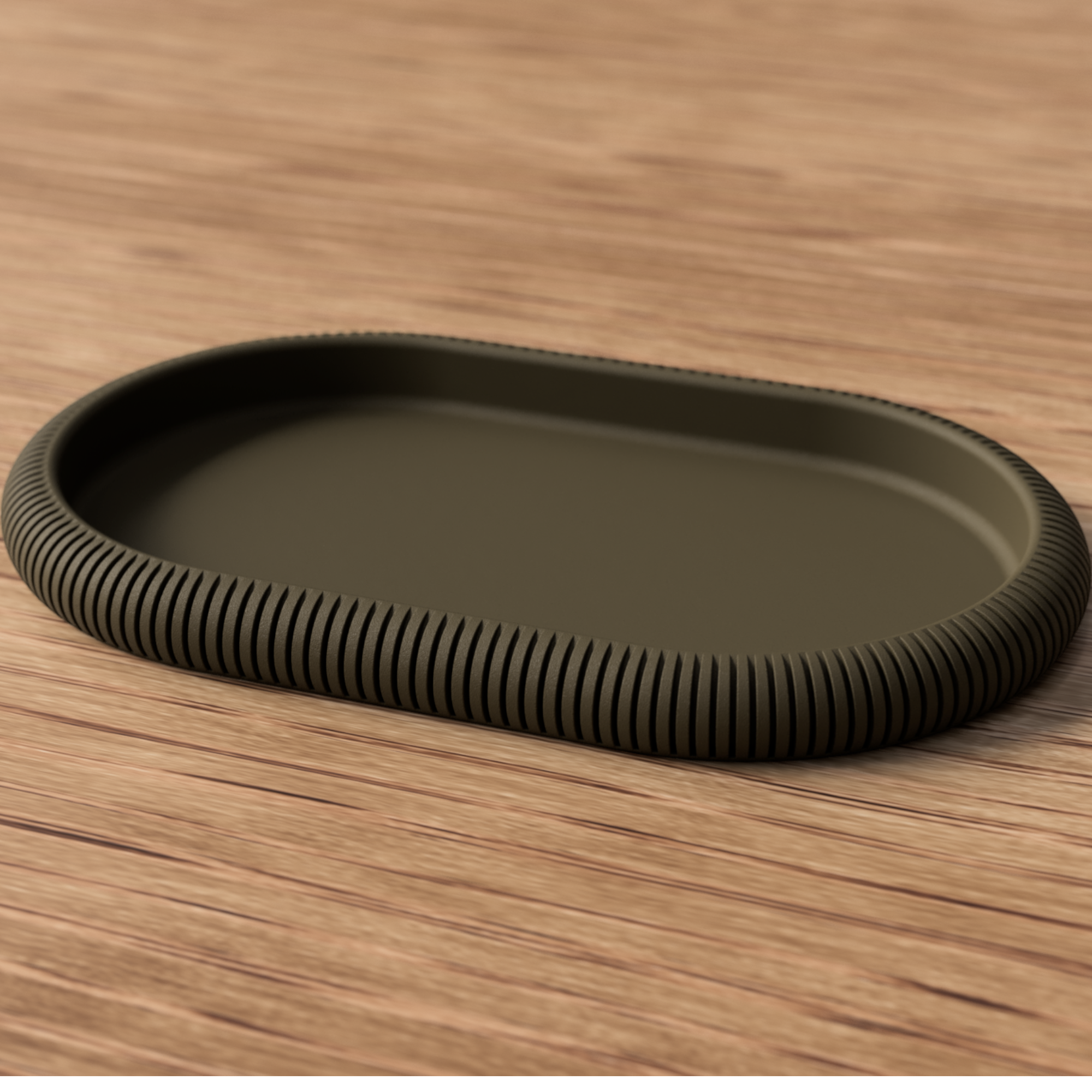 Ovales Dekotablett in Schwarz mit flachem Rand und gerillter Außenkante auf Holzoberfläche, passend für reduzierte Osterdeko.