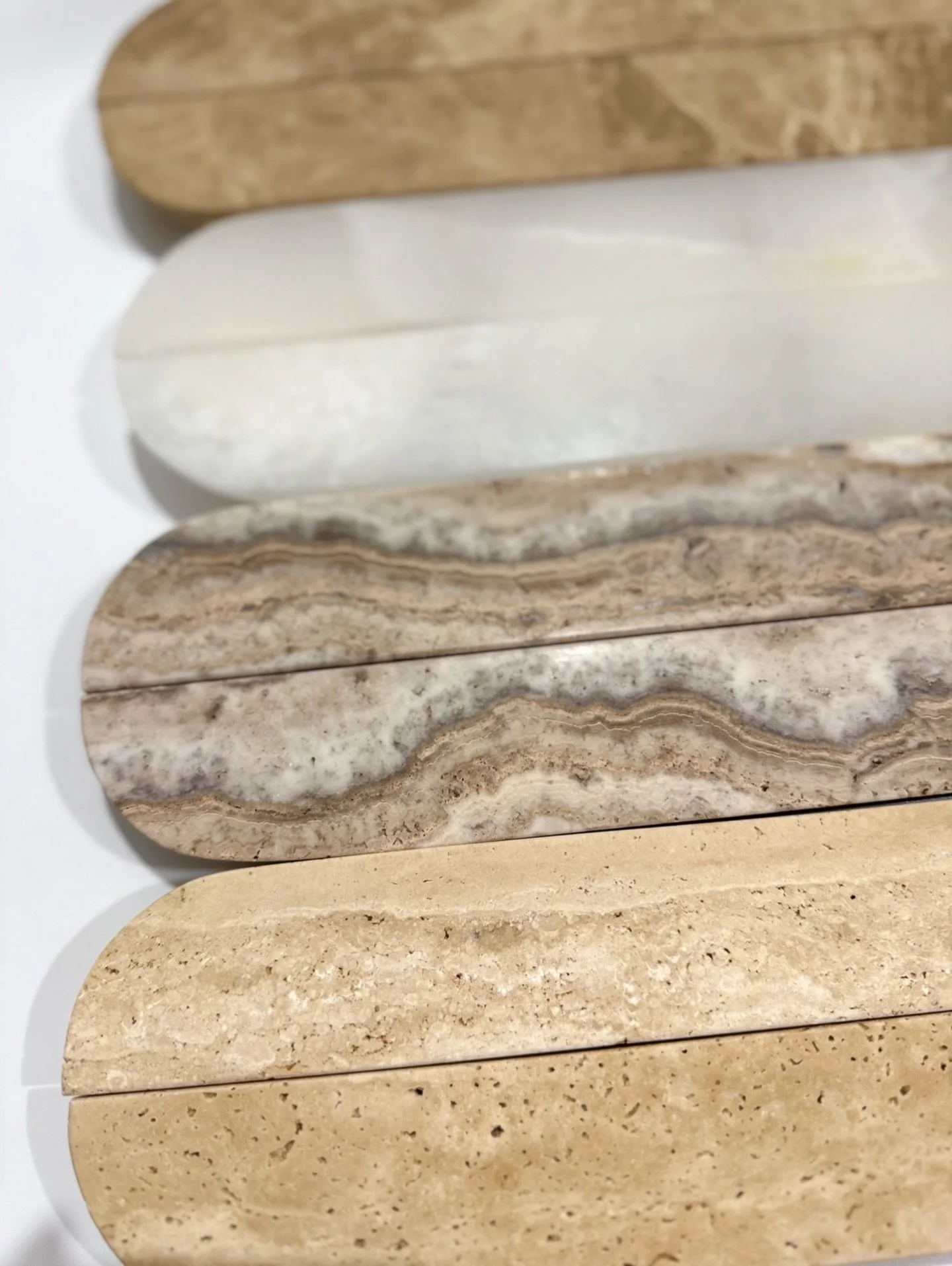 Our two Travertine styles, White Onyx and Light Emperador all lined up 🤎
