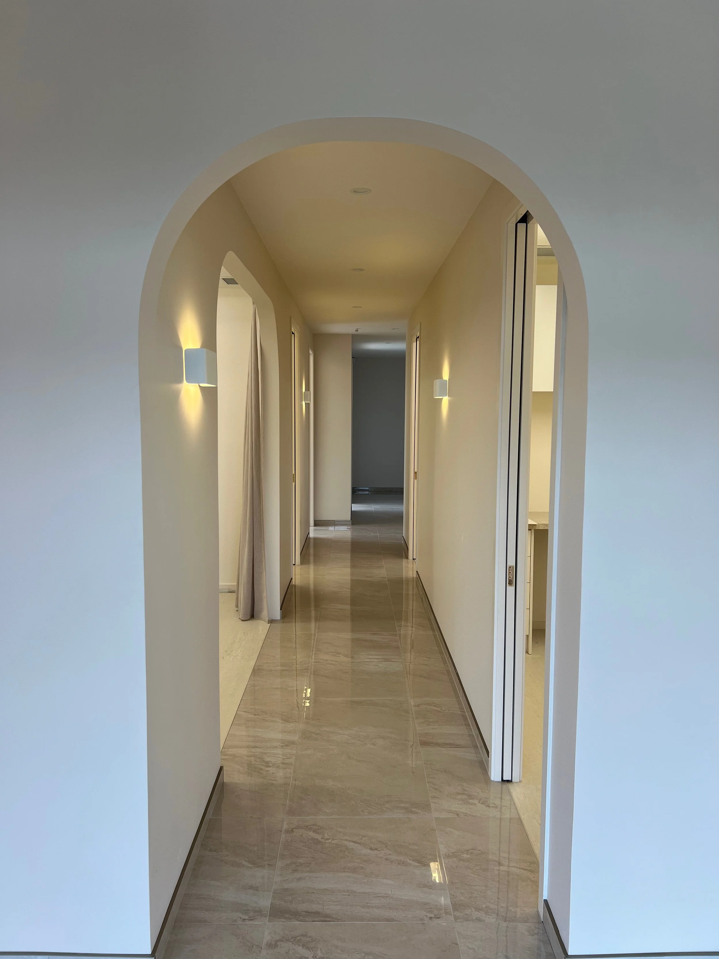 Custom commercial fit-out featuring a focal archway and curved doorways for Luxe Aesthetics, a boutique beauty salon in Prebbleton, Selwyn.