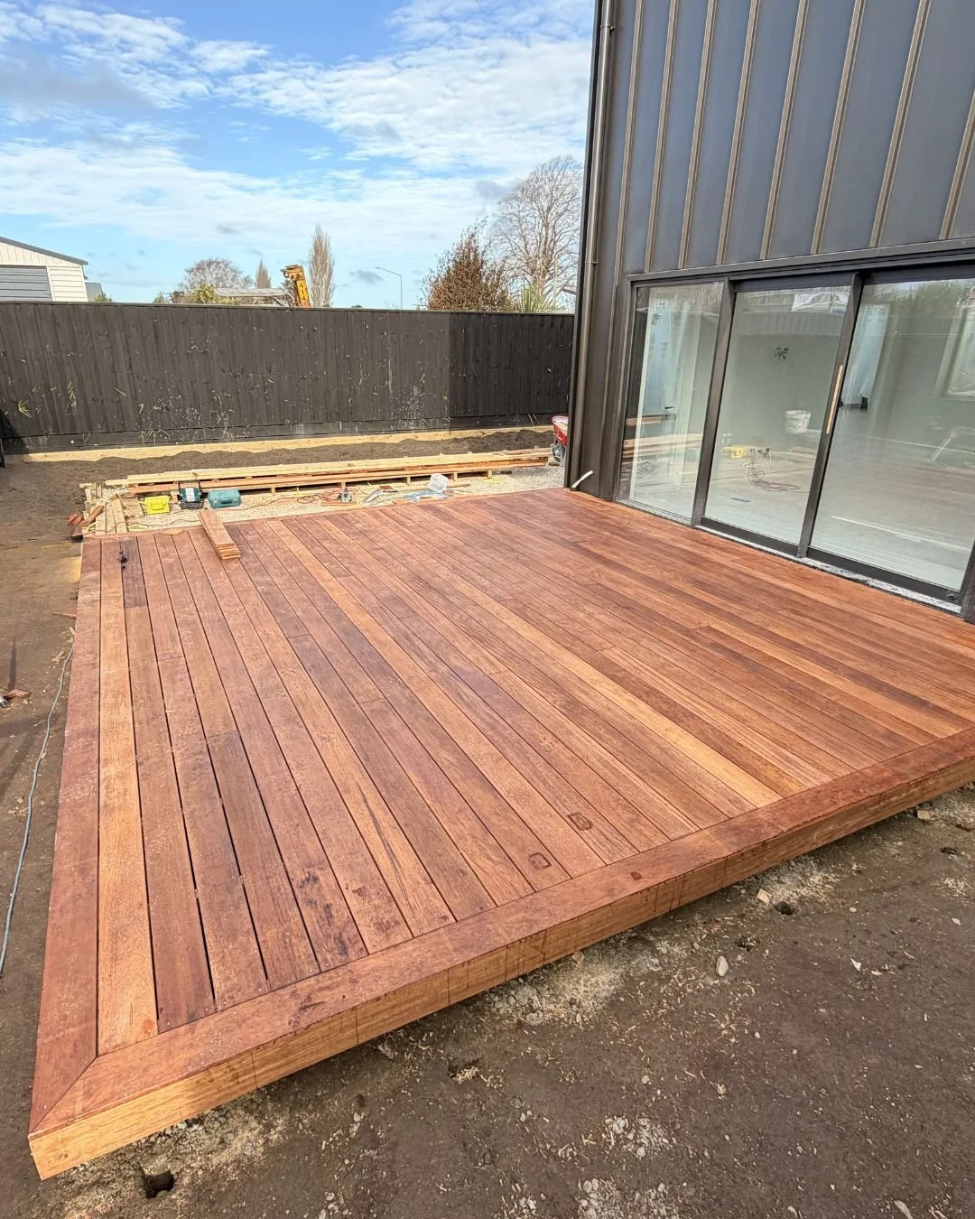 Featuring picture frame edging, this custom kwila deck was built for our client Bespoke Built in Christchurch