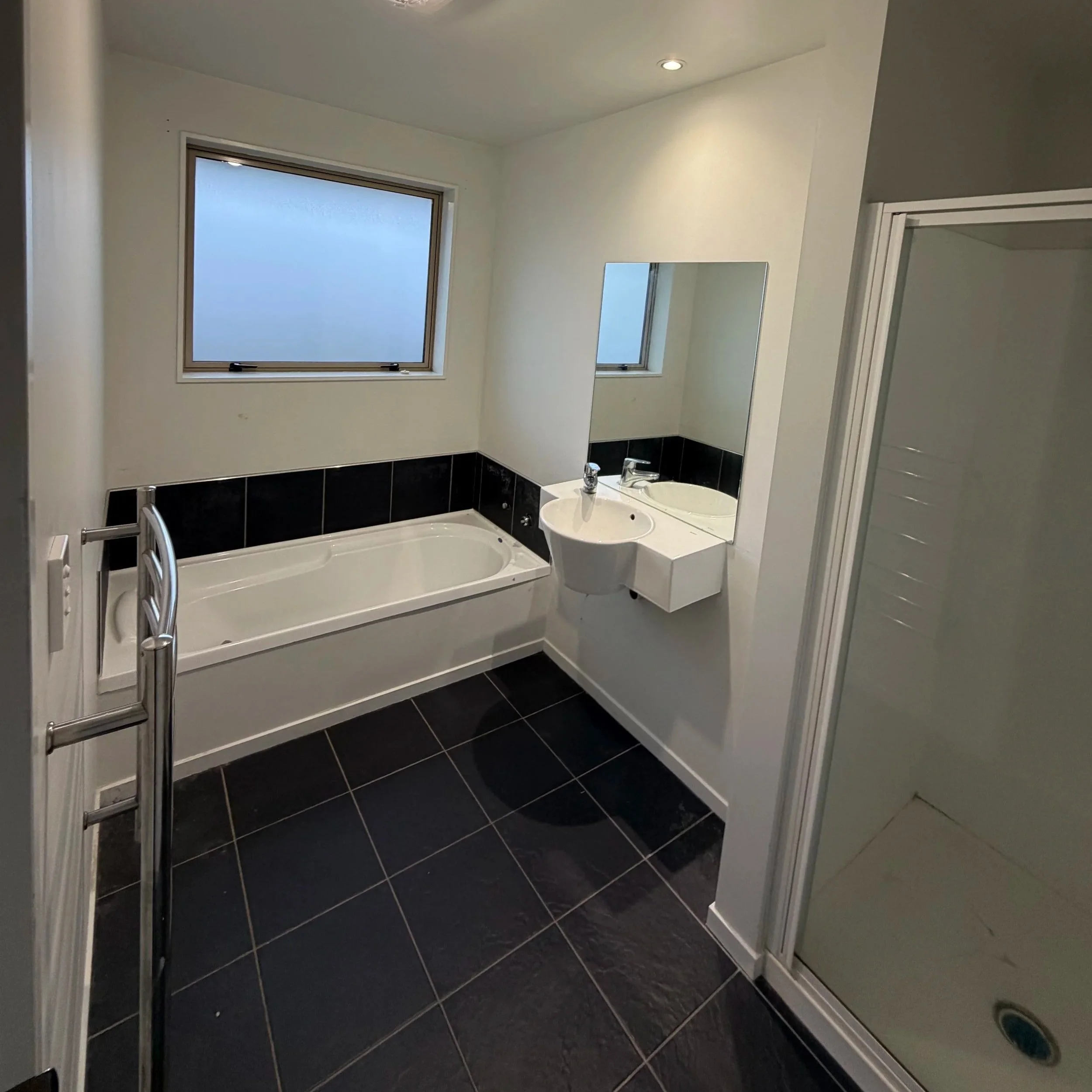 An older style bathroom, ready for renovation by Dunshea Construction