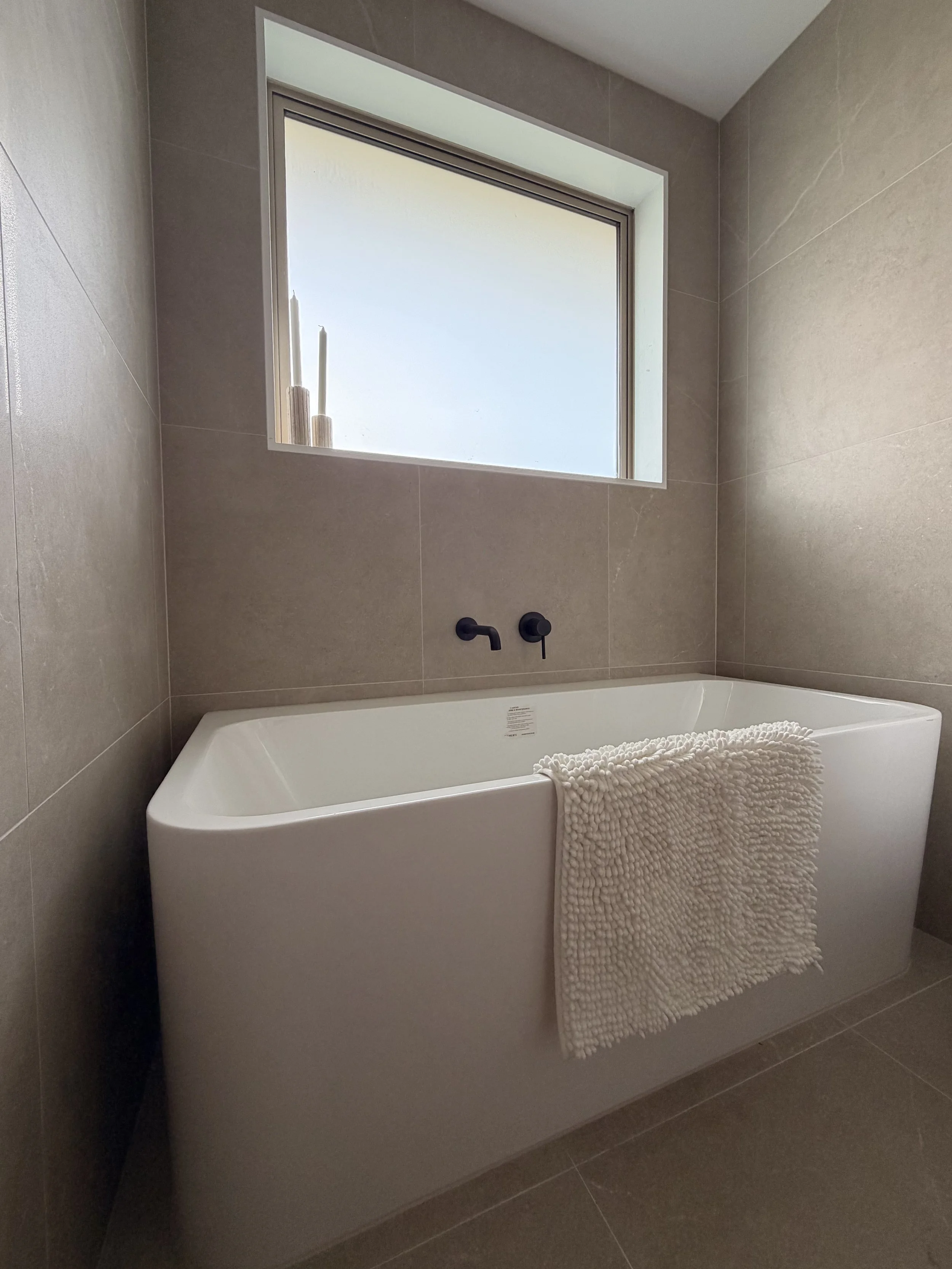Freestanding bath and full wall tiles for bathroom renovation in Rolleston, Christchurch