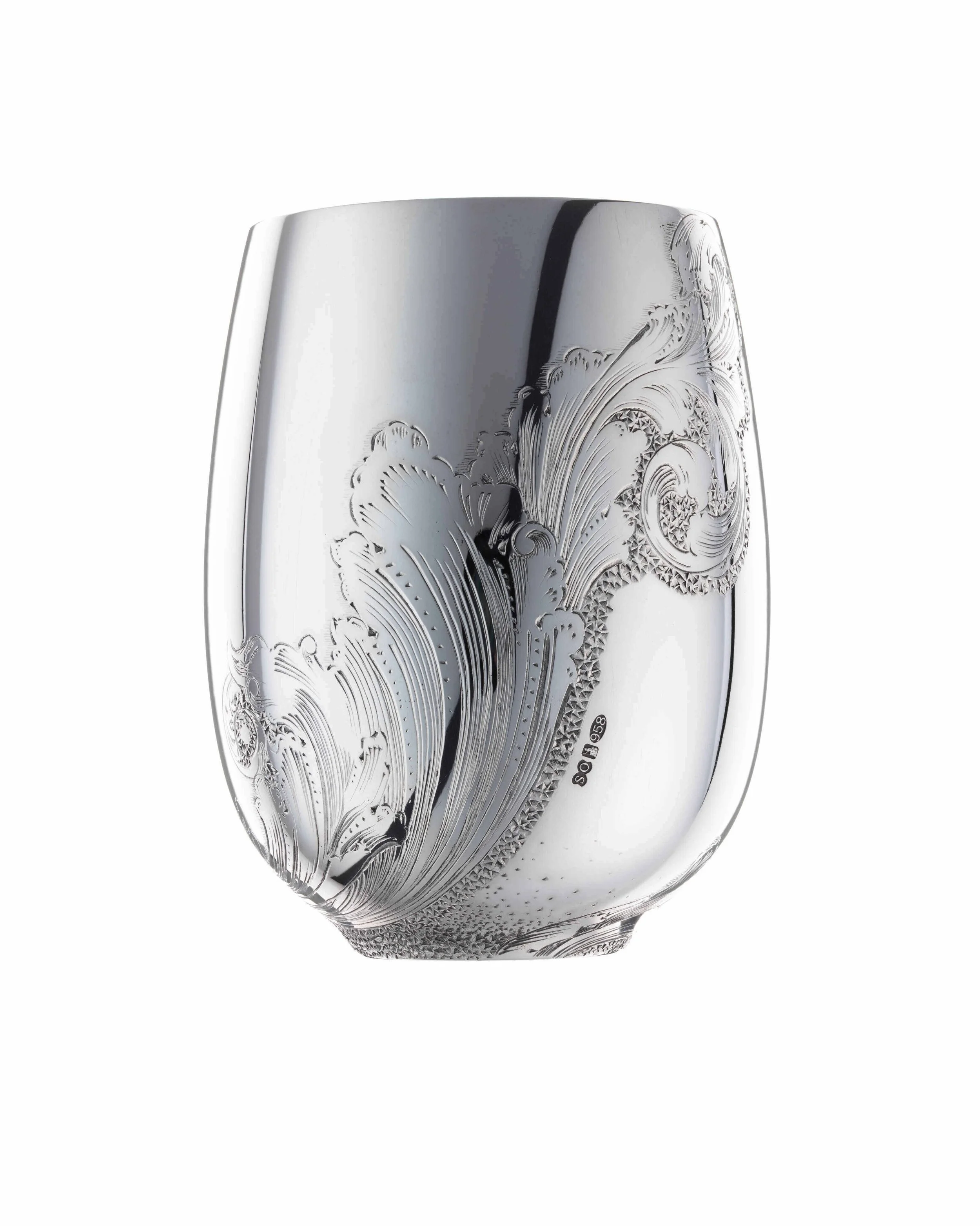 Sterling silver vessel with an engraved filigree design by silversmith Harry Stokes.