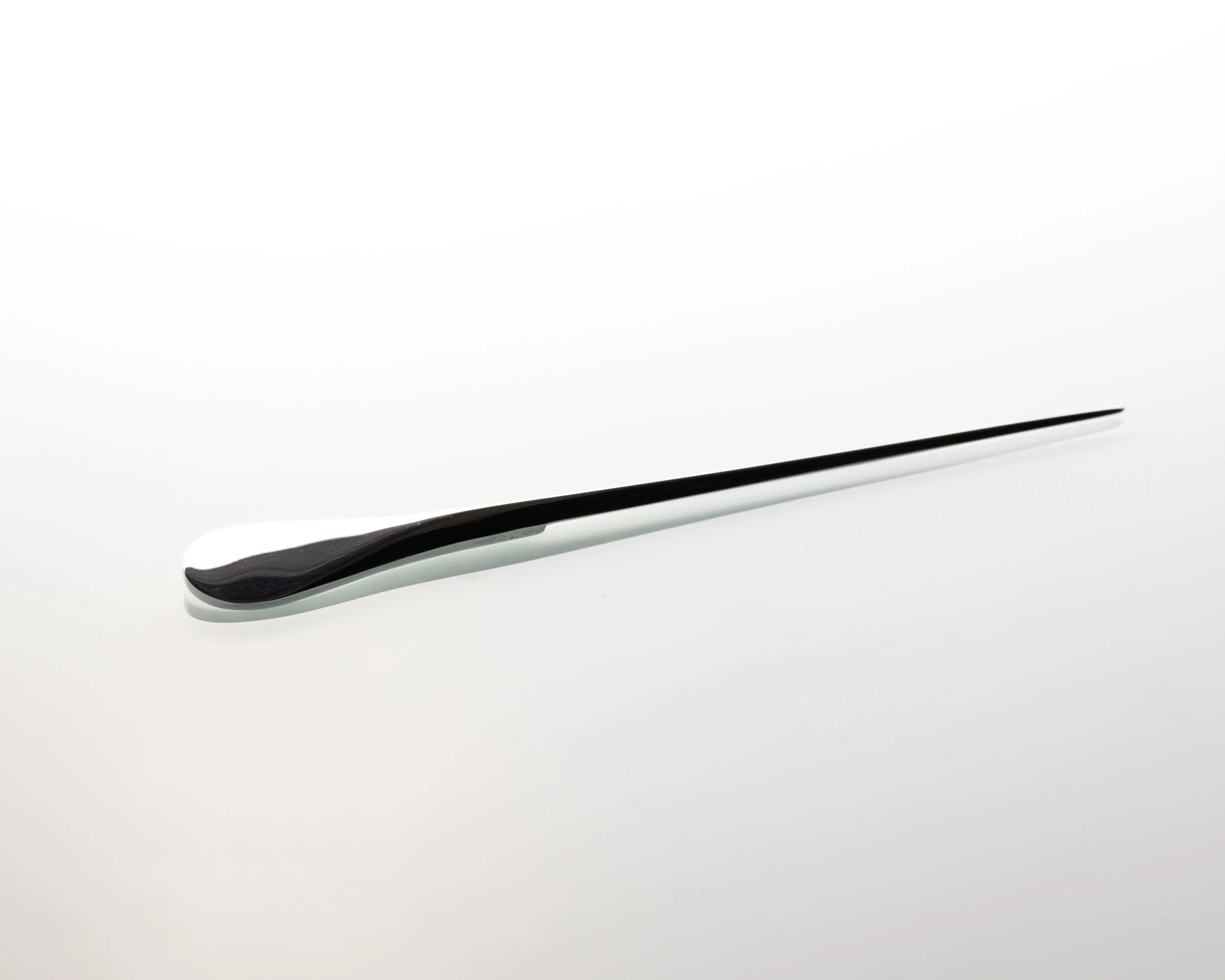 A modern sterling silver letter opener by silversmith Harry Stokes.
