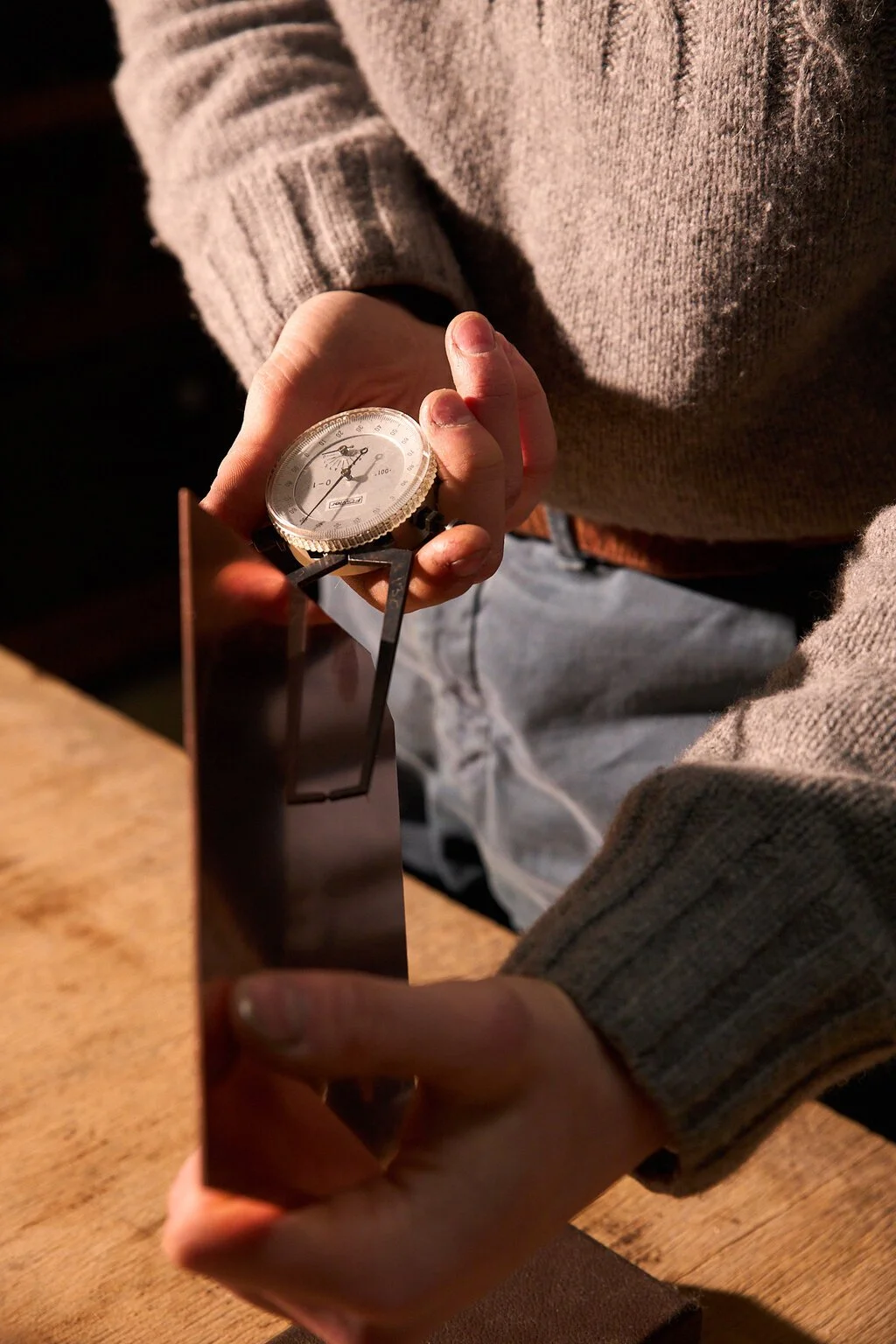A tool for quality silver held by silversmith Harry Stokes.