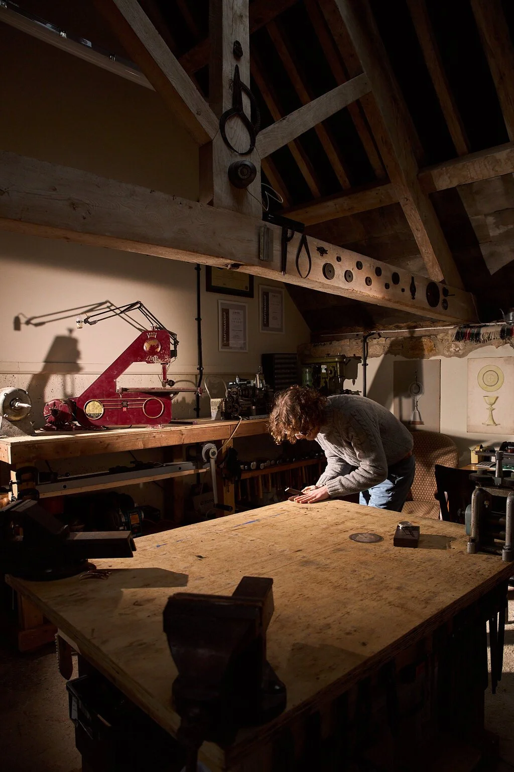 Silversmith Harry Stokes working in his workshop near the Cotswolds.