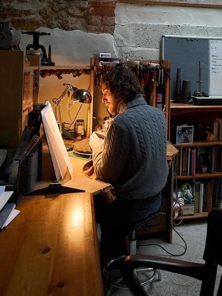 Silversmith Harry Stokes working in his workshop on the edge of the Cotswolds.
