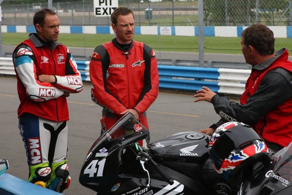 Michael Neeves instructing at the Honda Ron Haslam Race School on a Honda CBR1000RR Fireblade with chief instructor Adrian Clarke and super student Michael Fassbender