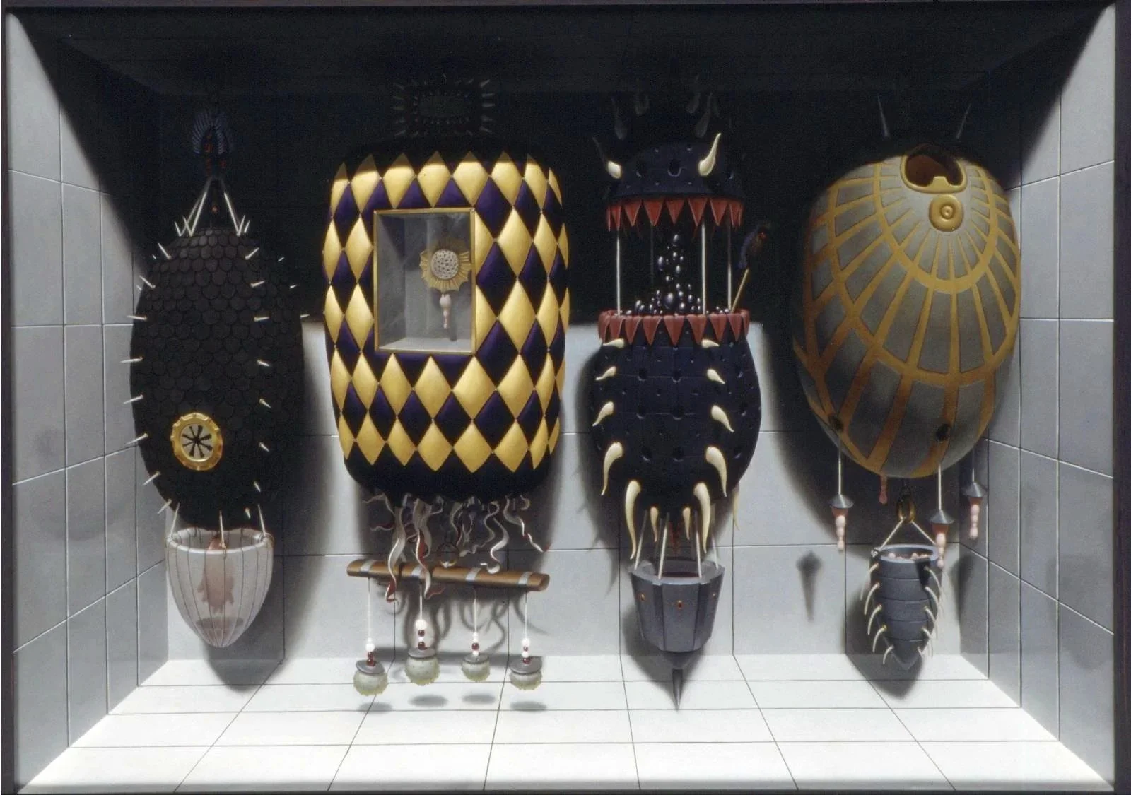 Display of five traditional African masks or sculptures on a tiled wall in a showcase.