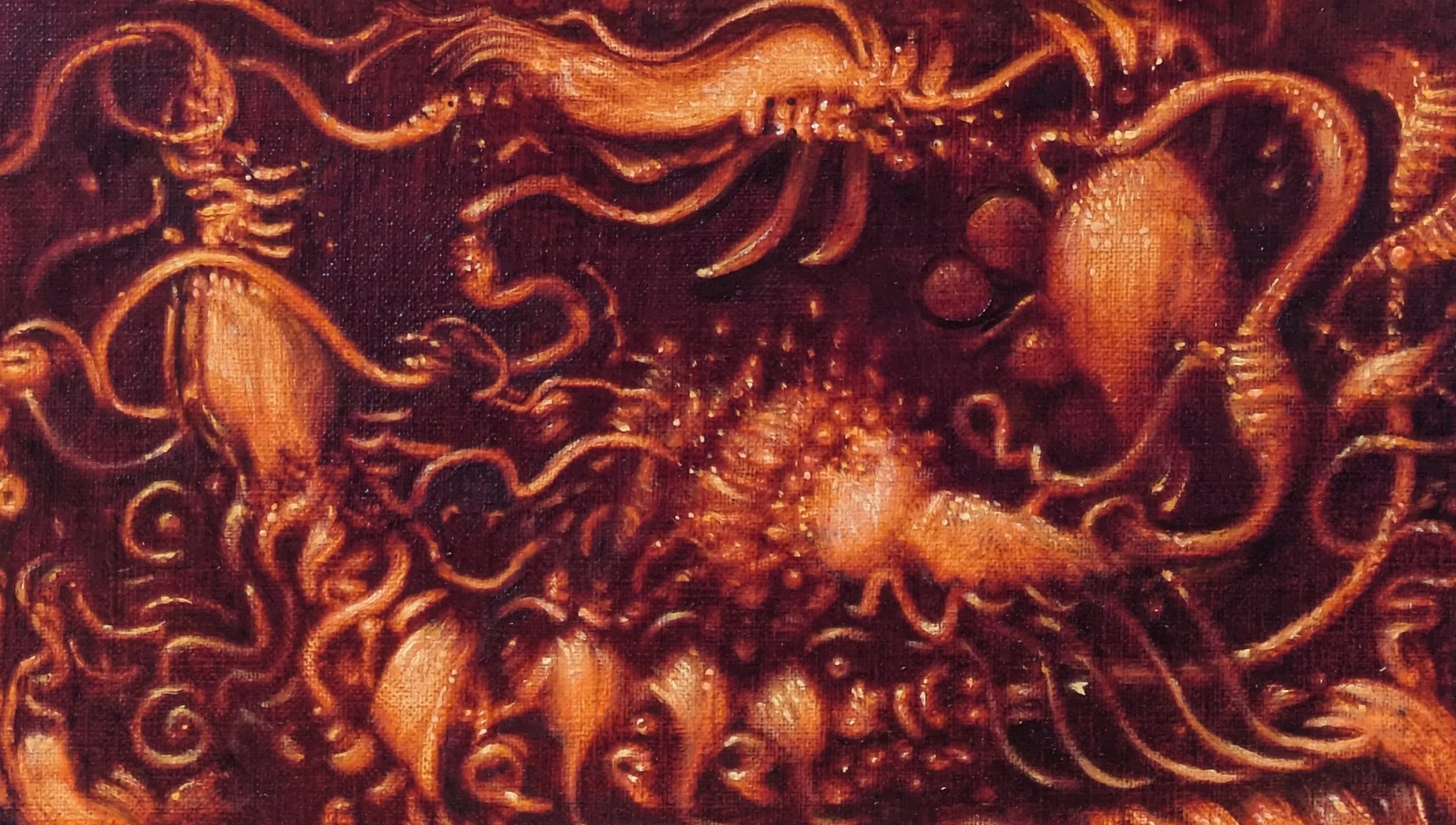 A close-up of a detailed, ornate, reddish-brown carved wooden design featuring swirling patterns and floral motifs.