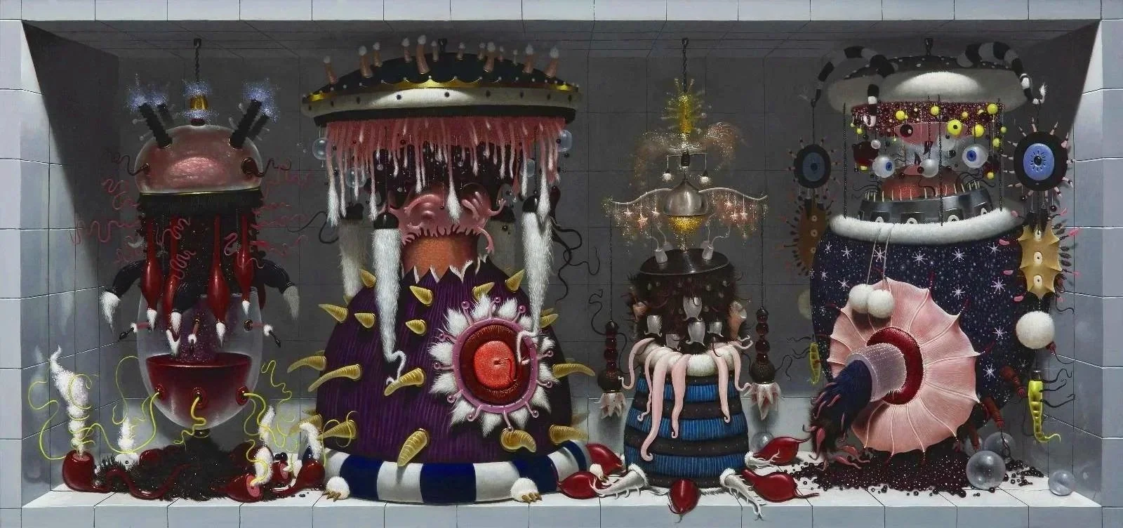 Display of four eclectic, artistic sculptures with whimsical, fantasy-inspired design elements, including various organic and abstract shapes, whimsical features, and colorful decorations.