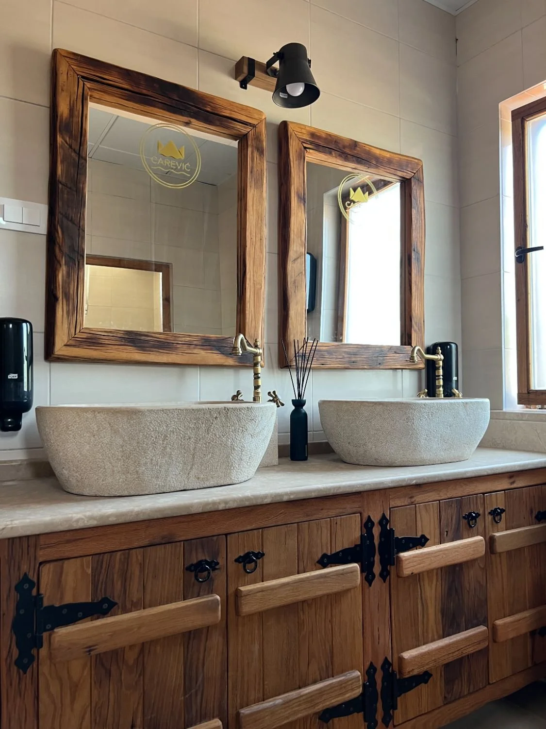Bathroom with two sinks and mirrors