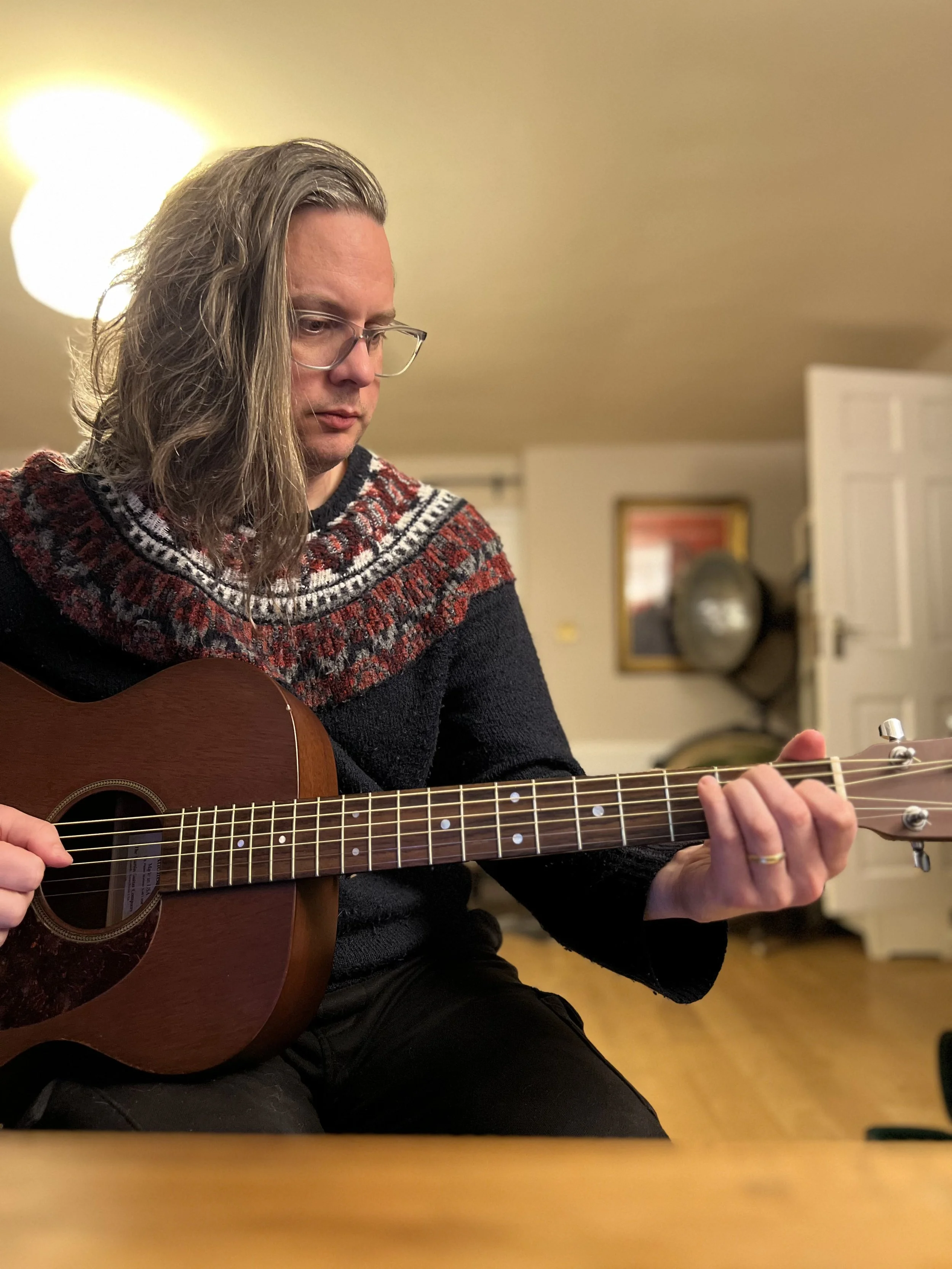 If you want to just learn acoustic guitar, just let me know