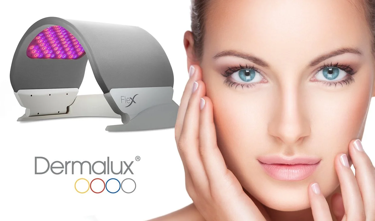 A woman with clear skin touching her face, and a light therapy device with a curved shape and pink-purple LED lights on one side, labeled 'Dermalux,' is shown beside her.